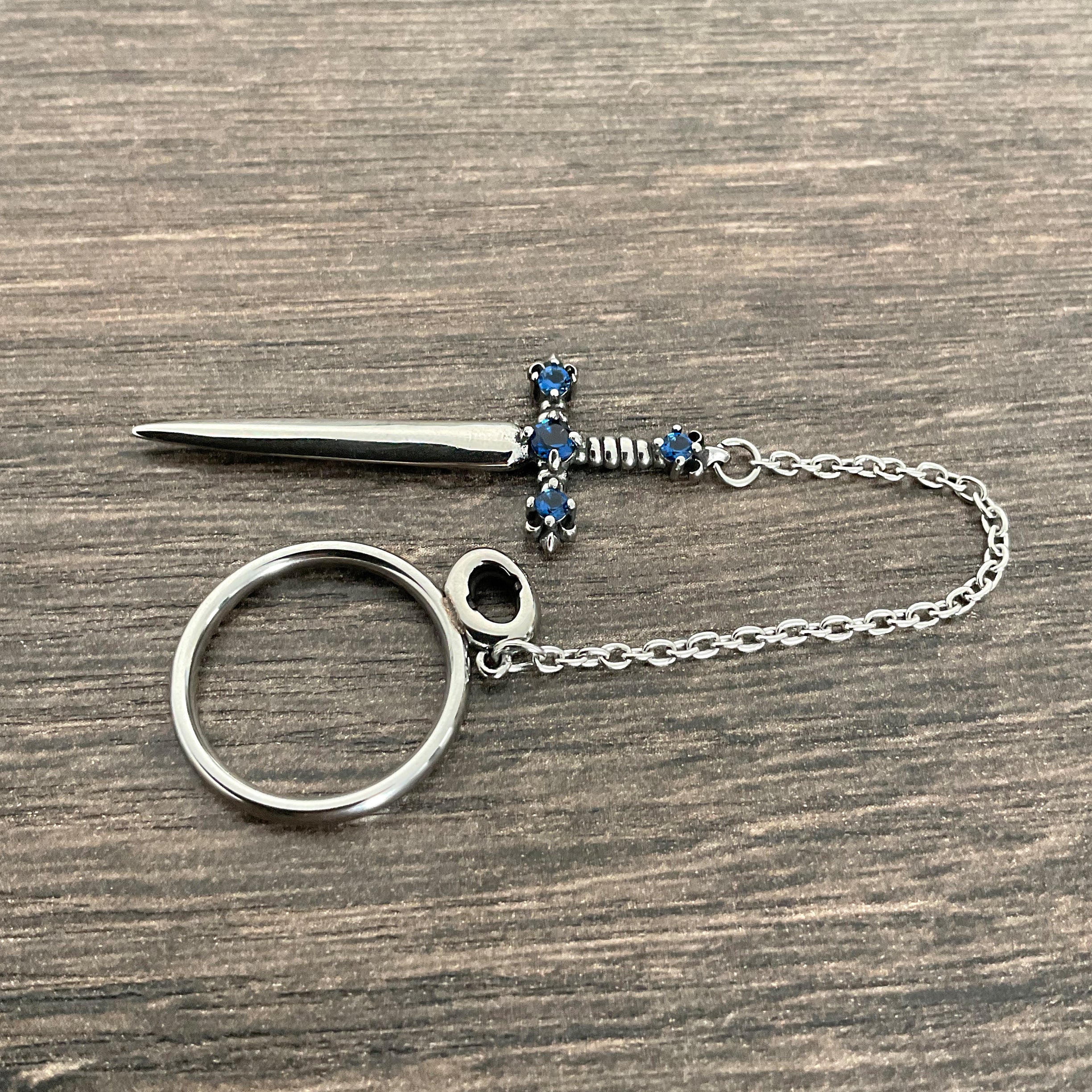 Fleur Sword ring with Sapphire CZ stones
