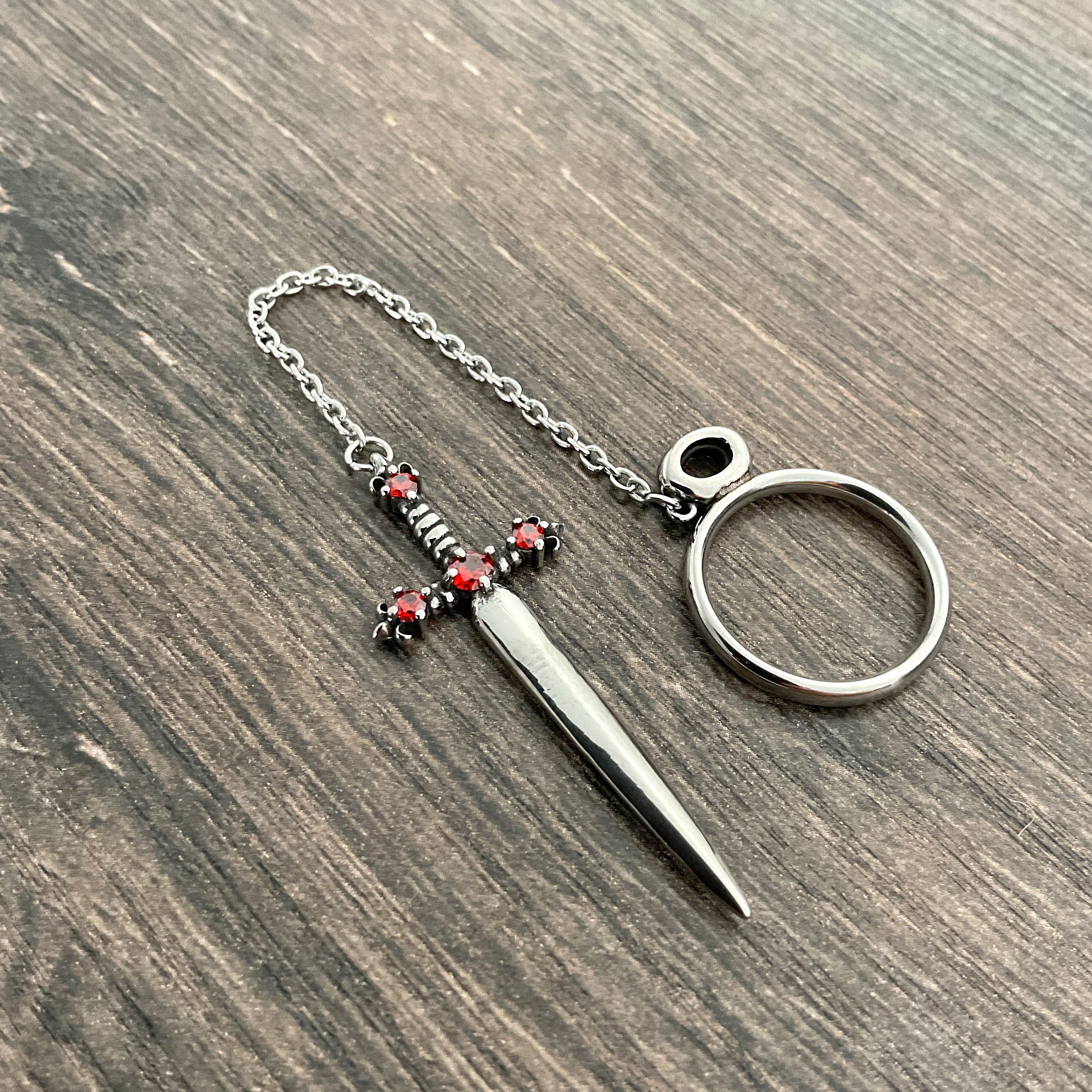 Fleur Sword ring with Ruby CZ stones