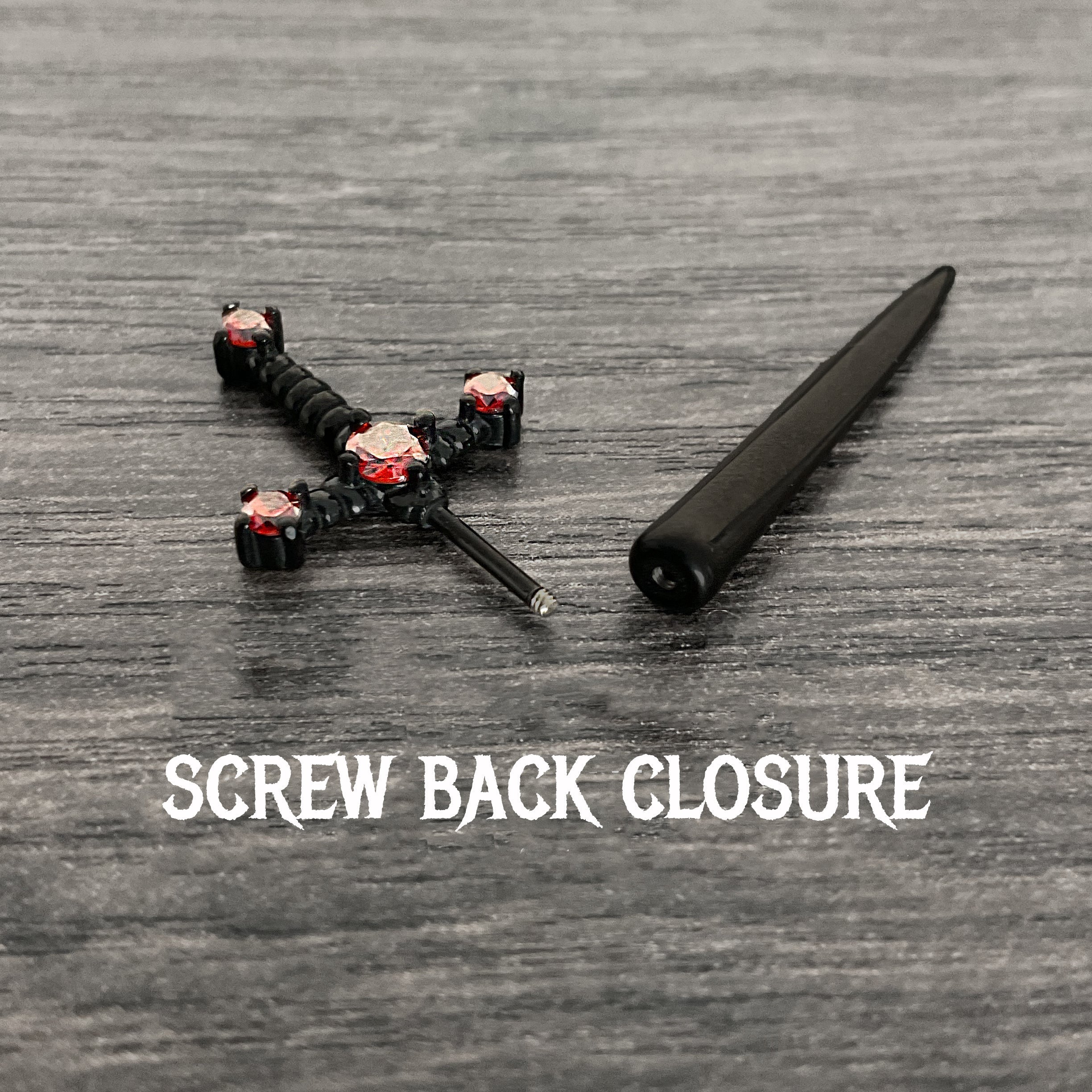 Kali black sword ear jacket with Ruby Red CZ