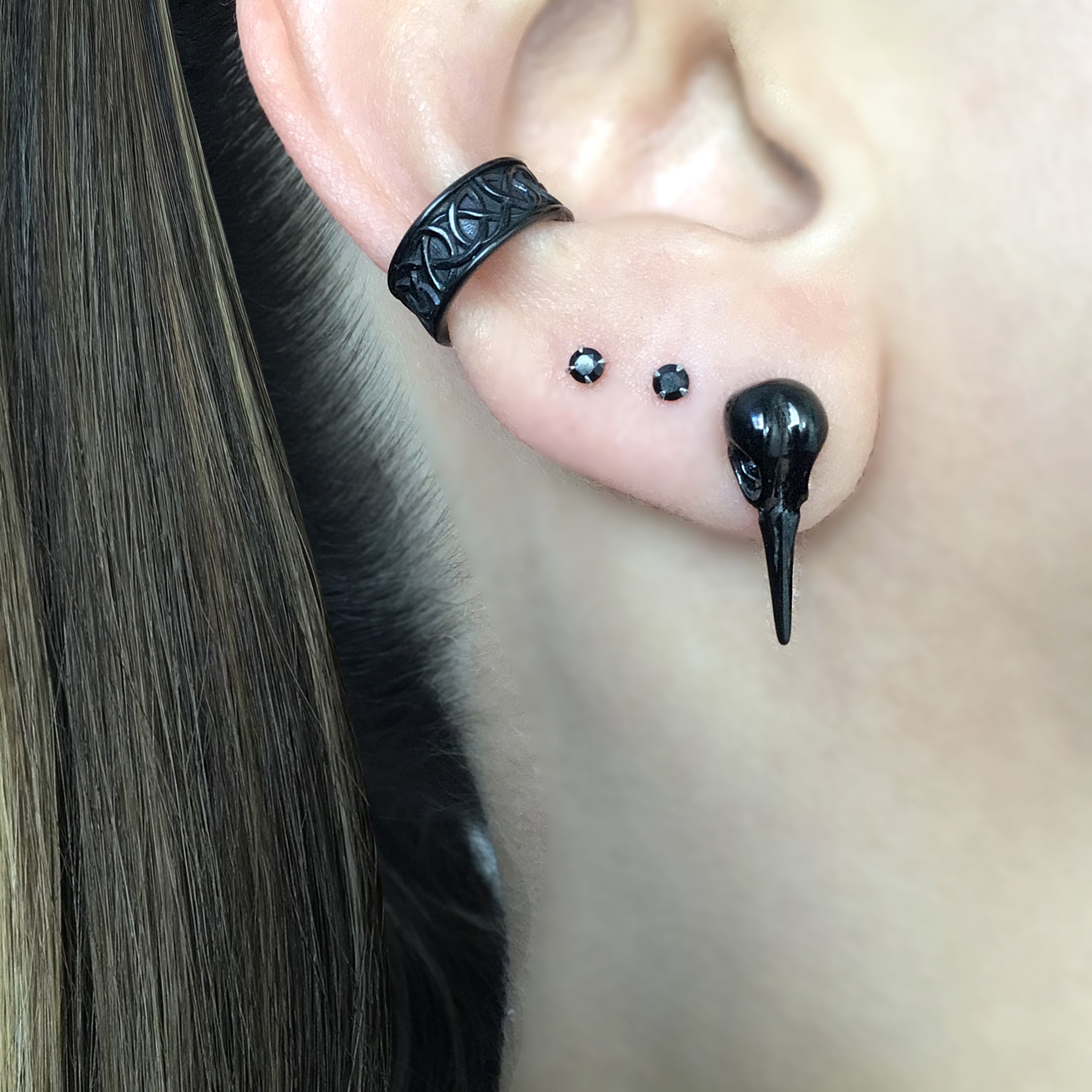 Hummingbird skull earrings