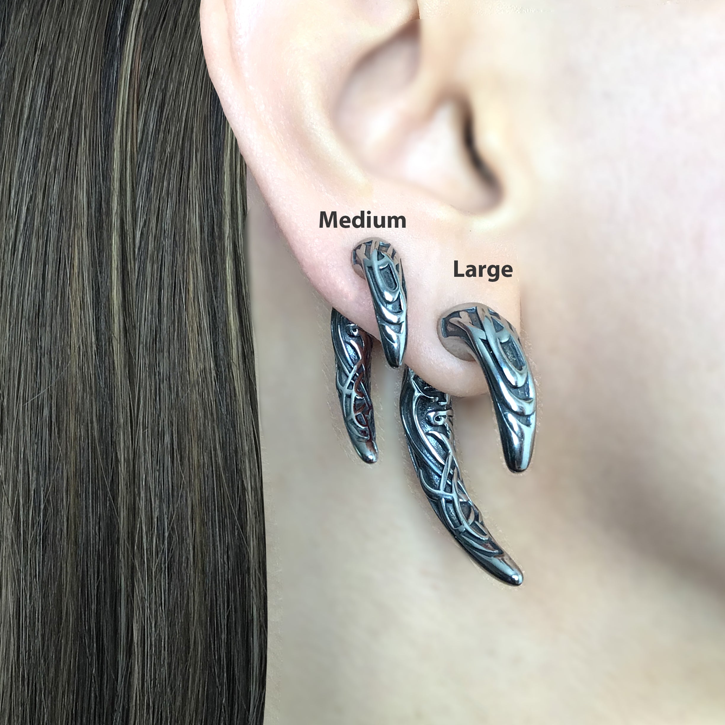 Claw ear jacket with Celtic design