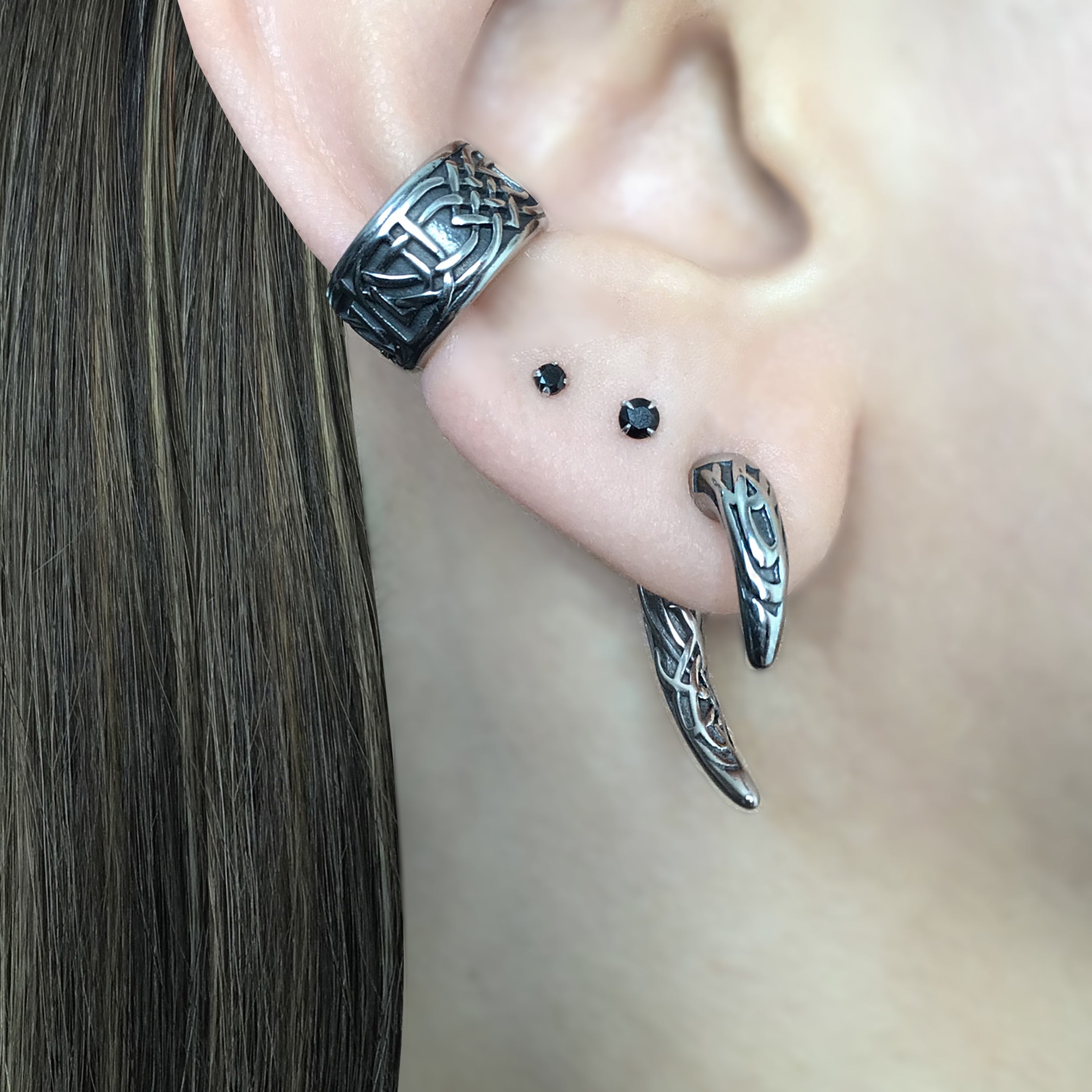 Claw ear jacket with Celtic design