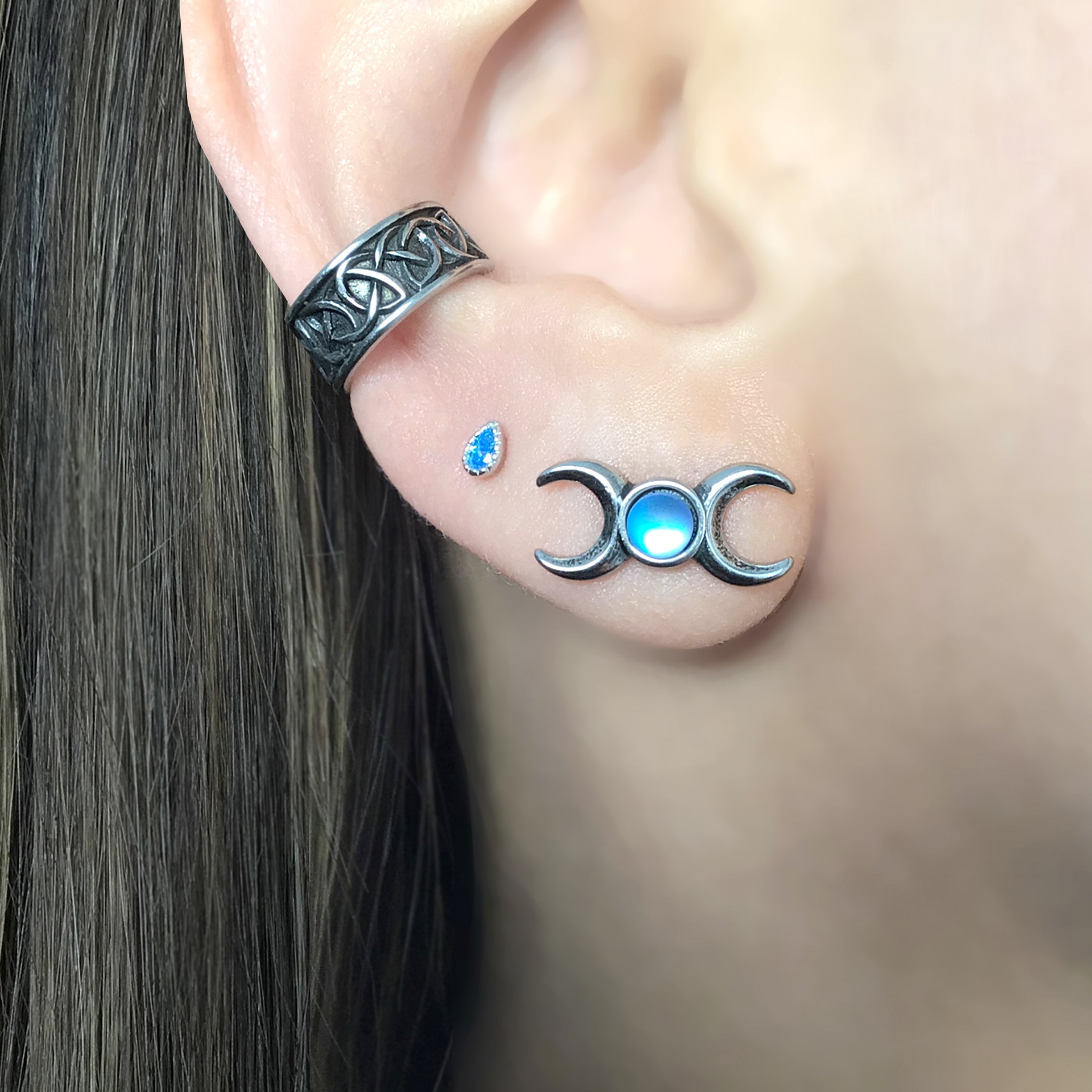 Two moons stud earrings with Blue stone