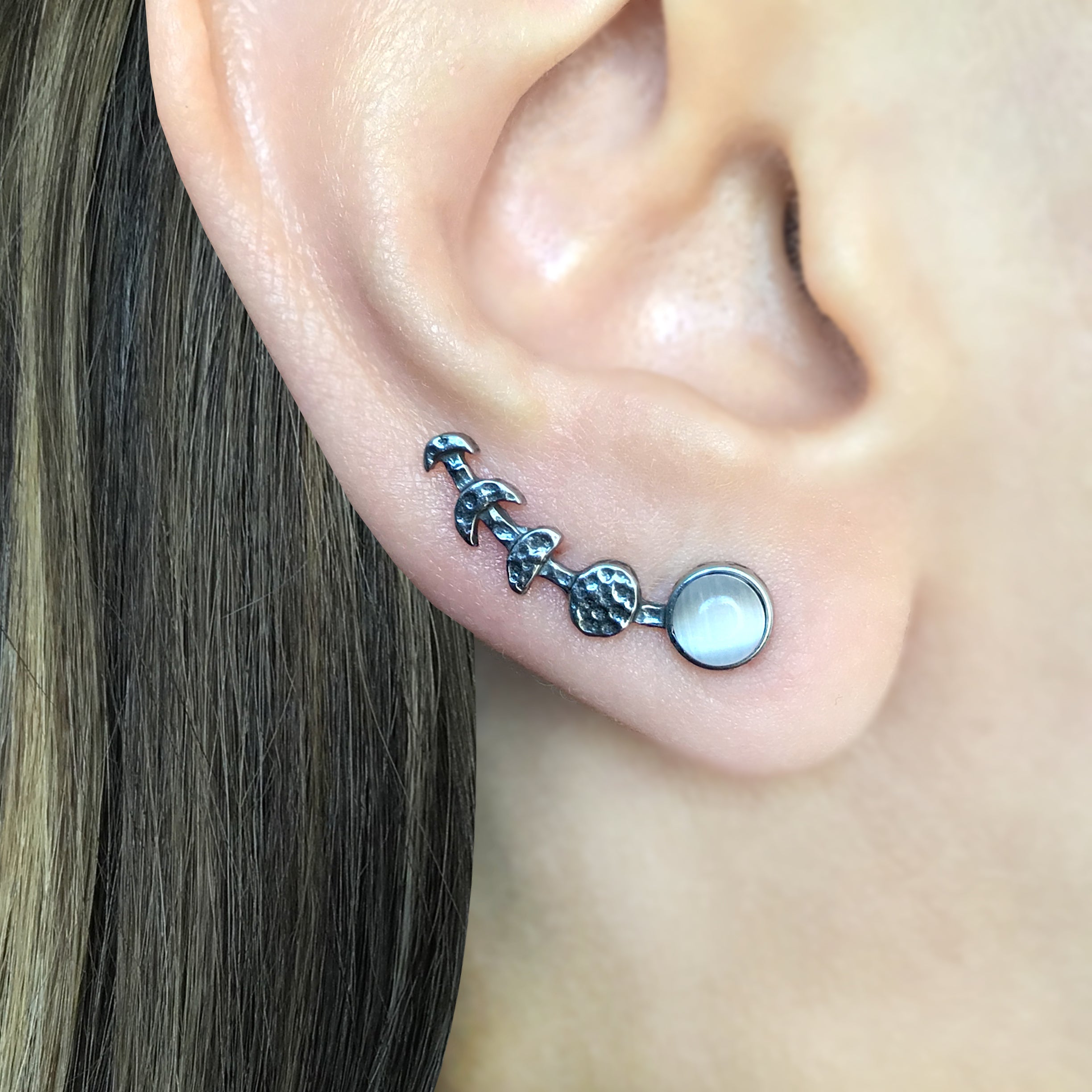 Moon phase ear crawler