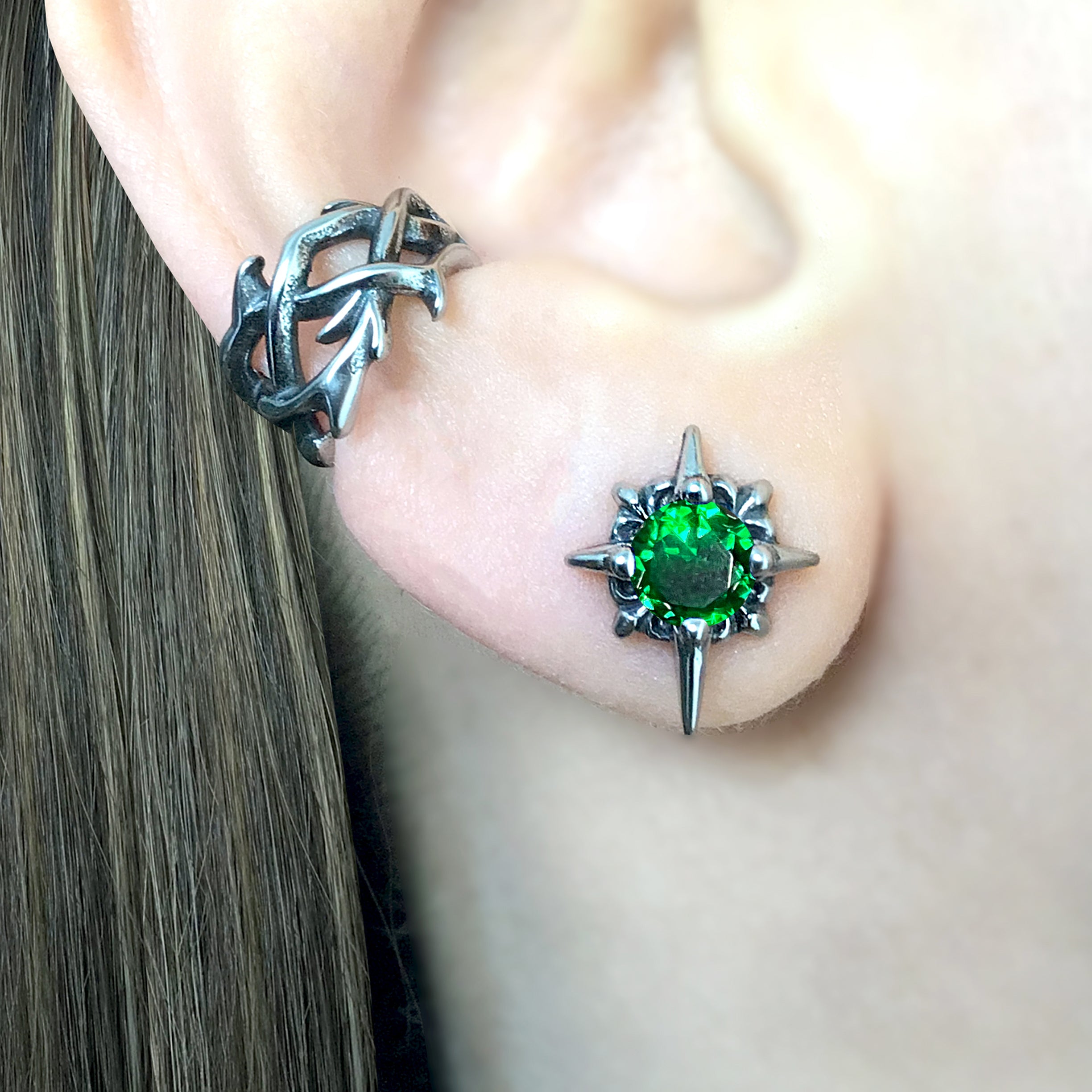 Starburst stud earrings with Green CZ