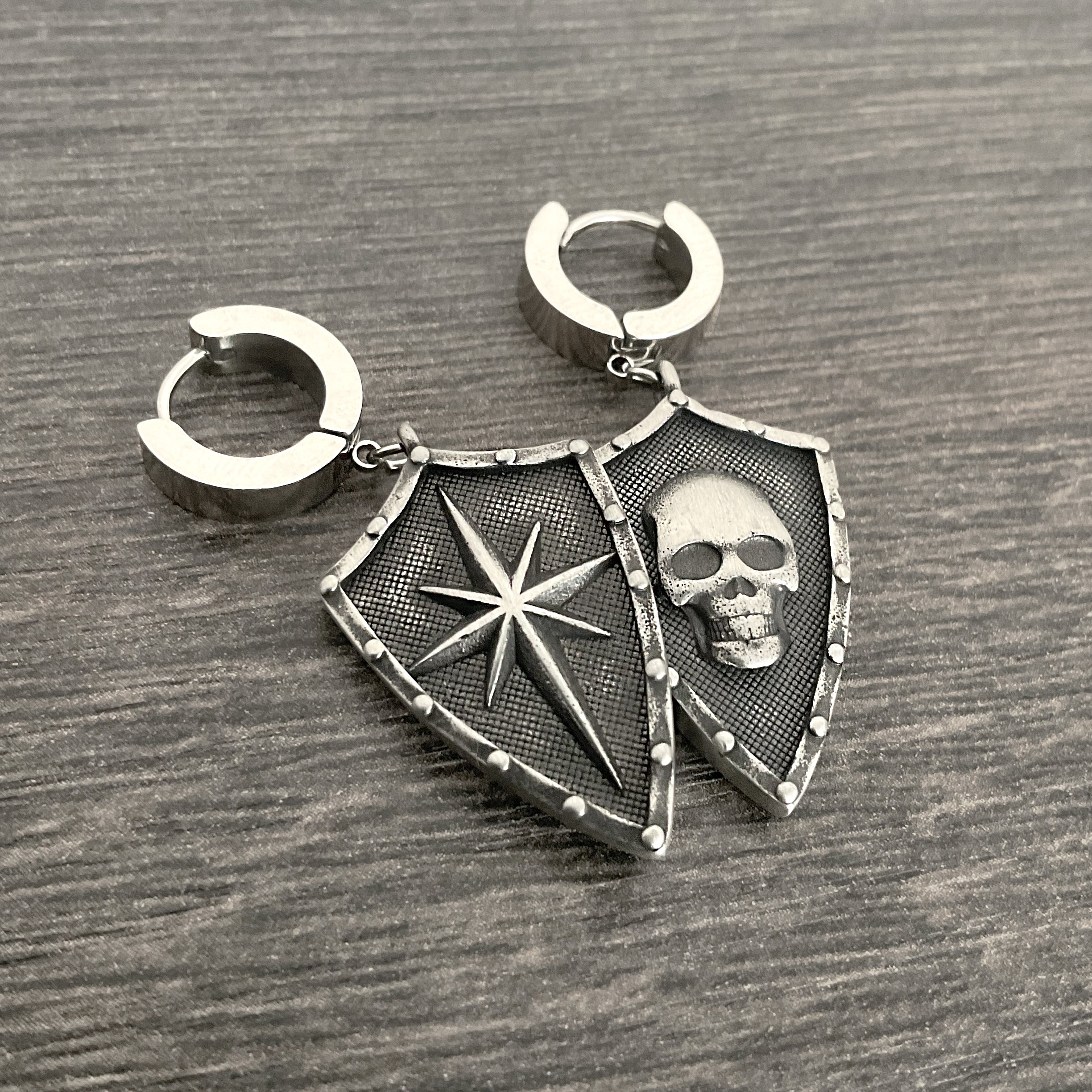 Shield with Skull hoop earring