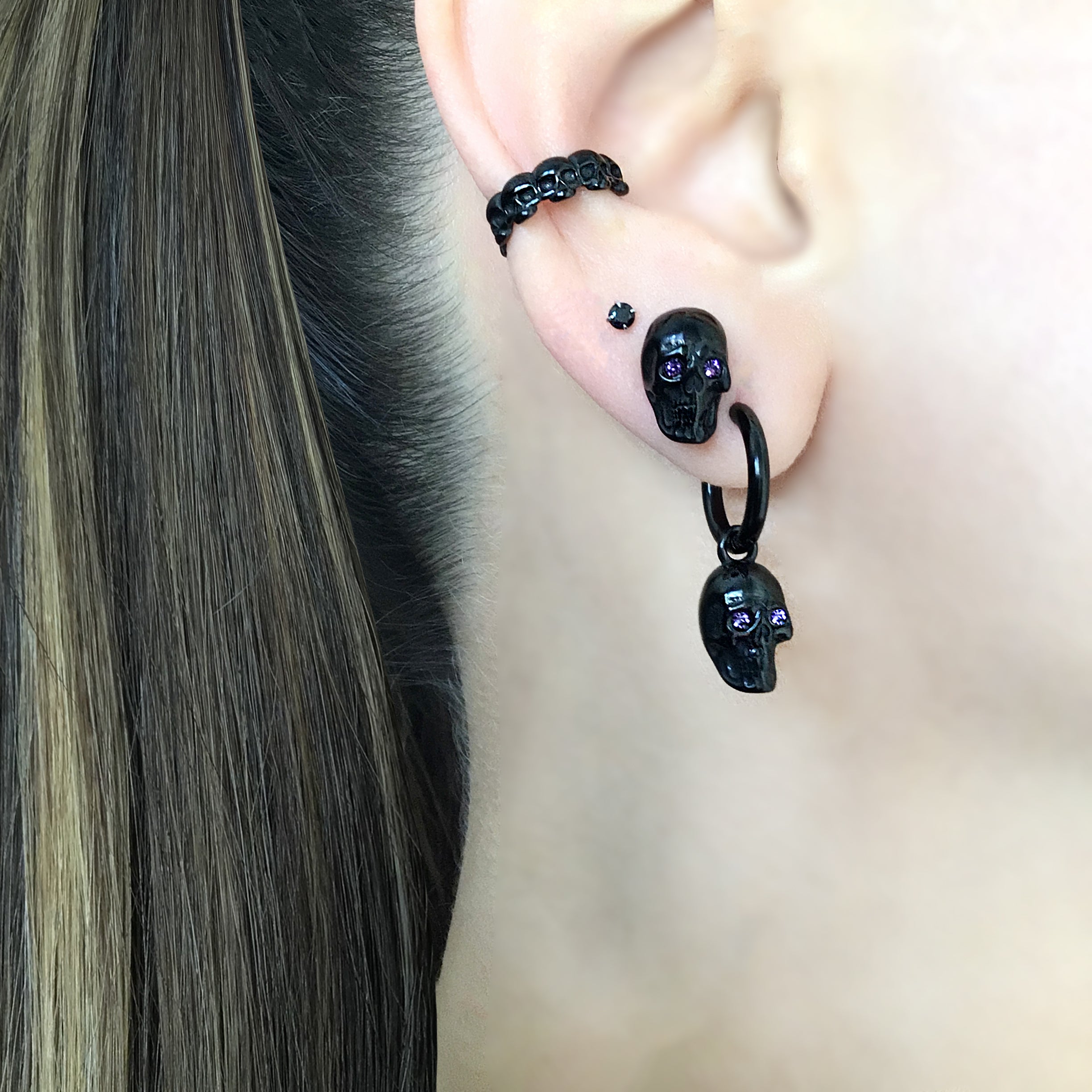 Skull studs with Purple eyes