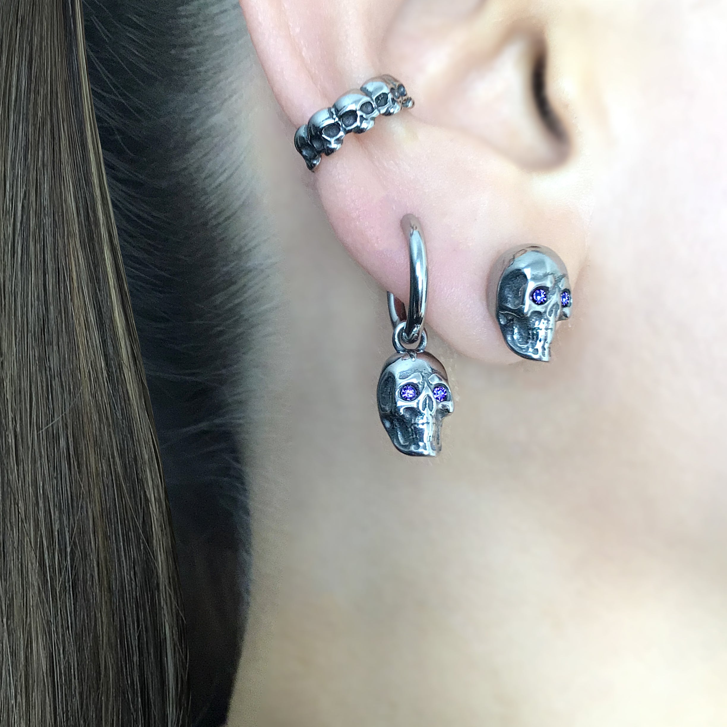 Skull studs with Purple eyes