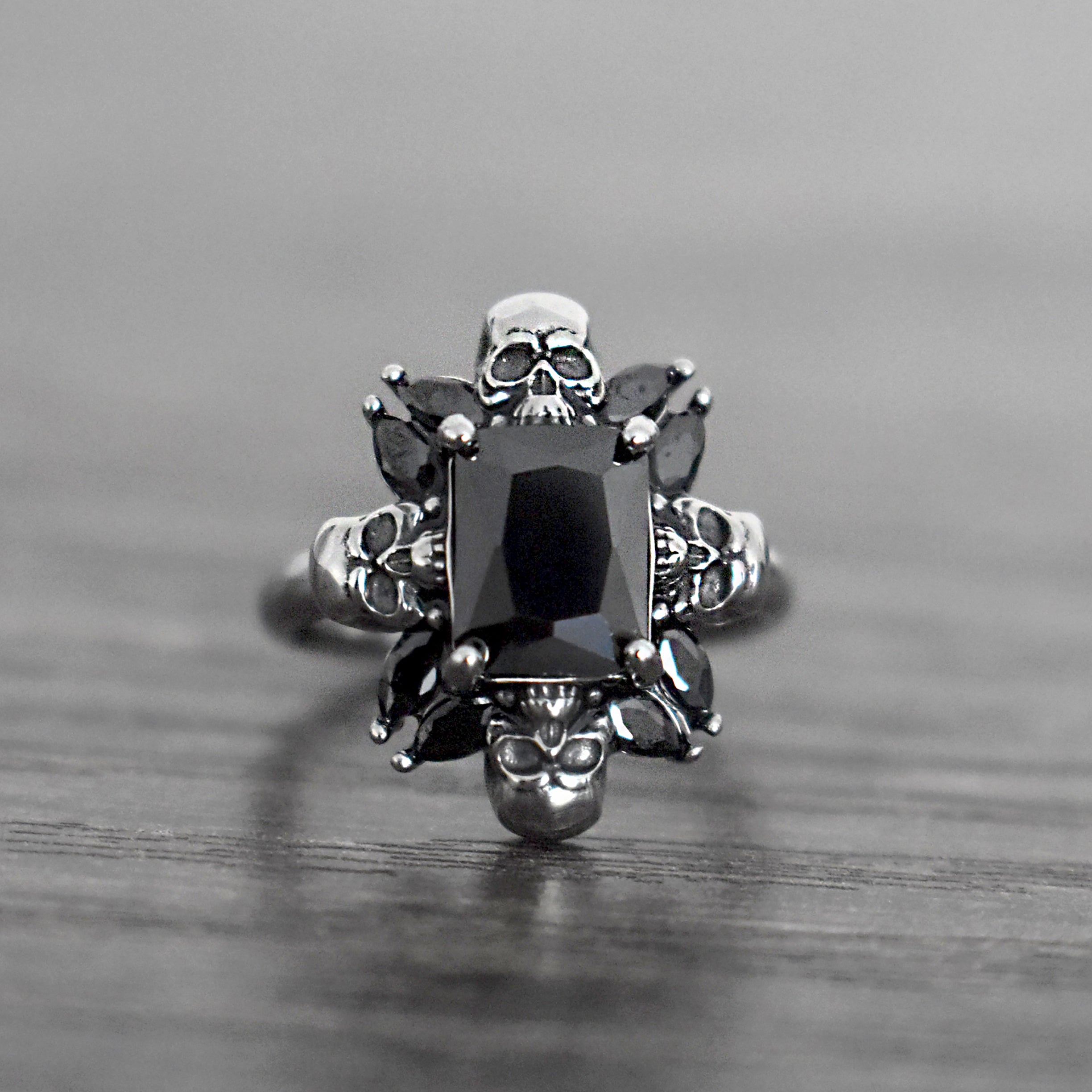 Renita ring with skulls and Blue CZ stones