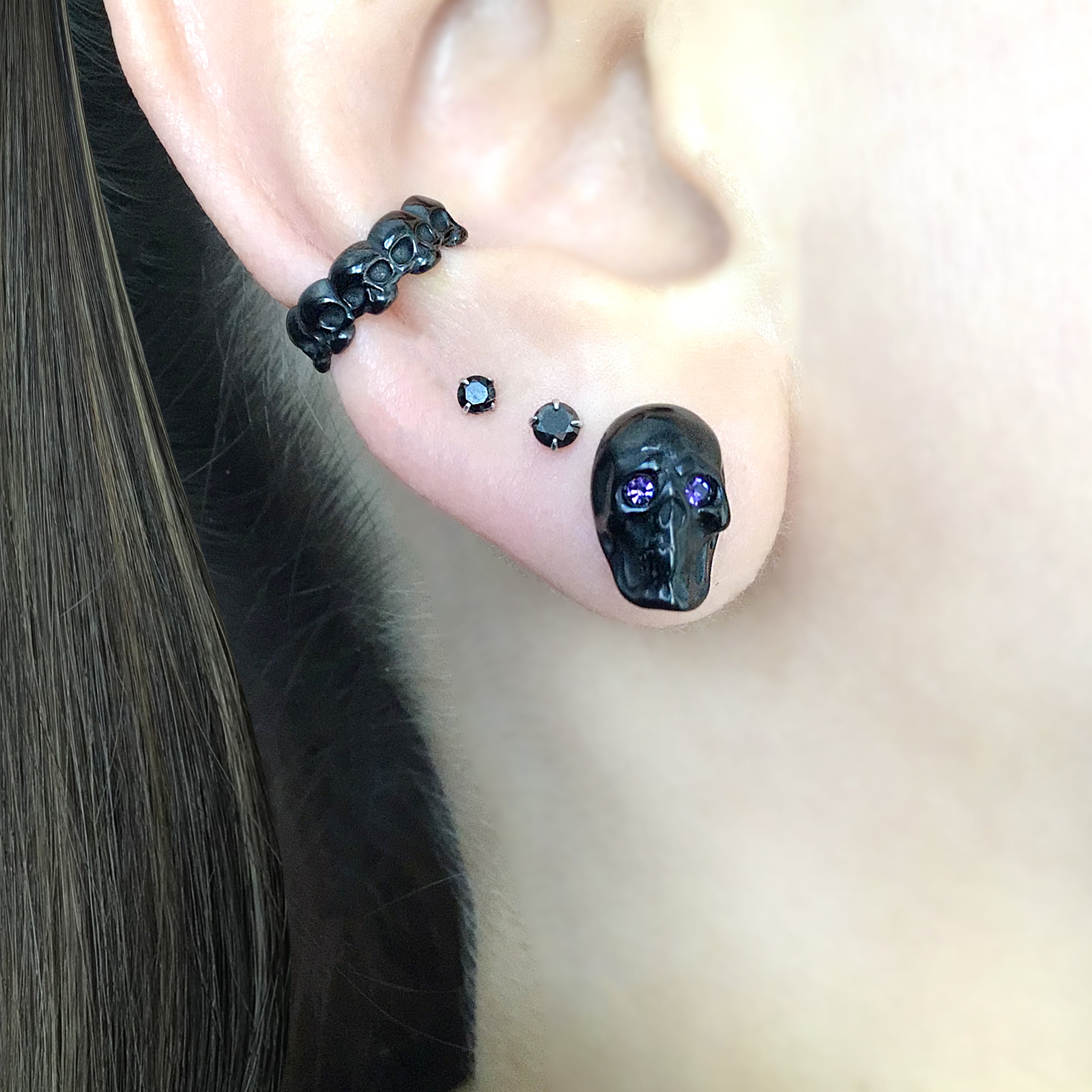 Skull studs with Purple eyes