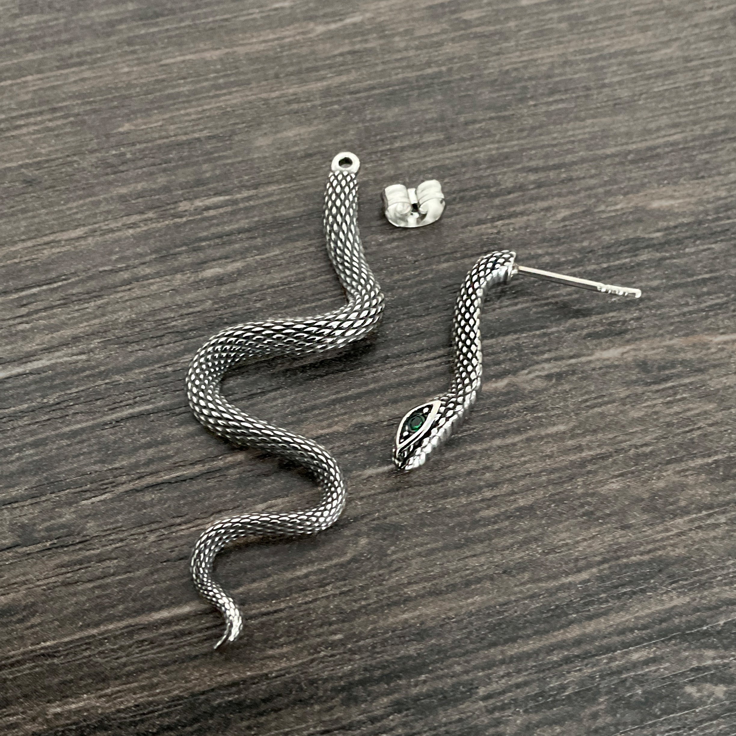 Snake ear jacket with Emerald CZ