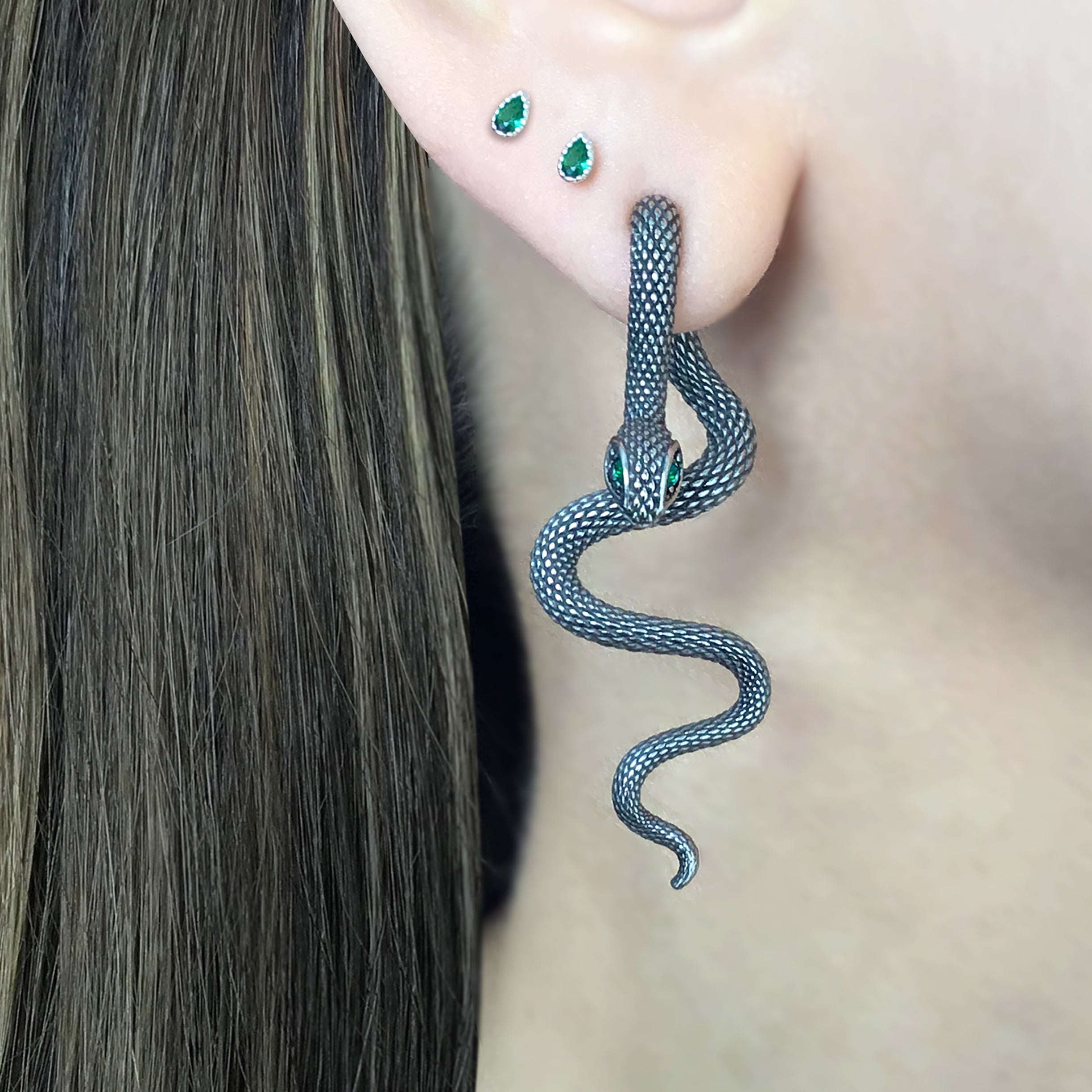 Snake ear jacket with Emerald CZ