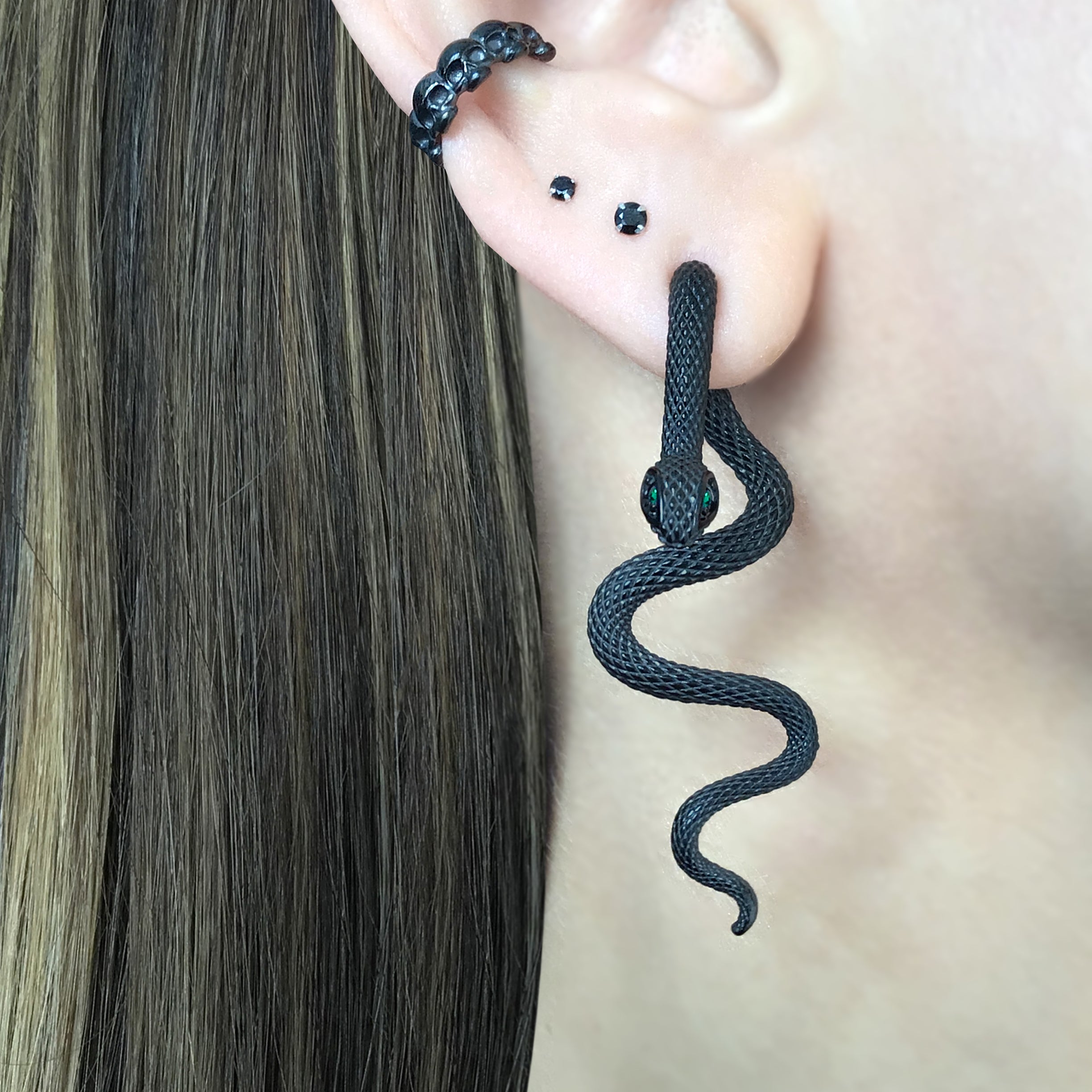 Snake ear jacket with Emerald CZ