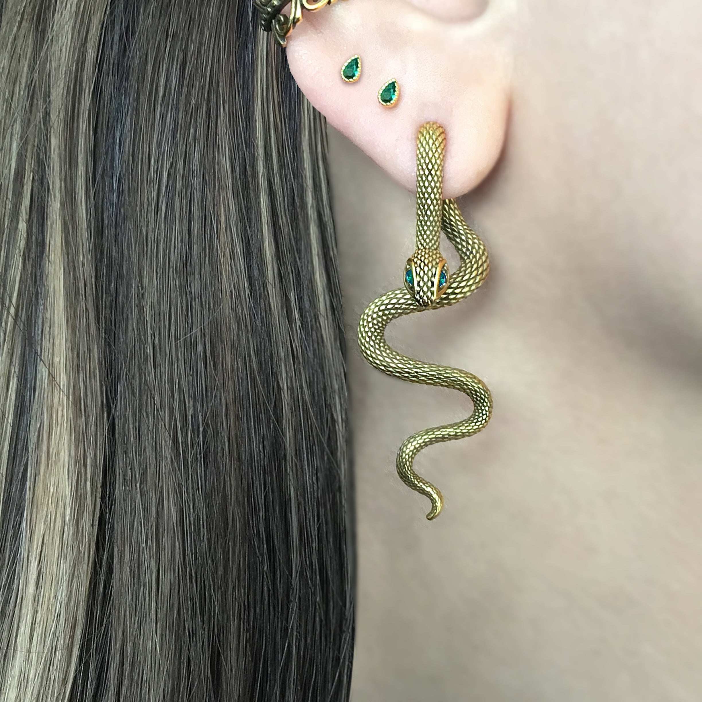 Snake ear jacket with Emerald CZ