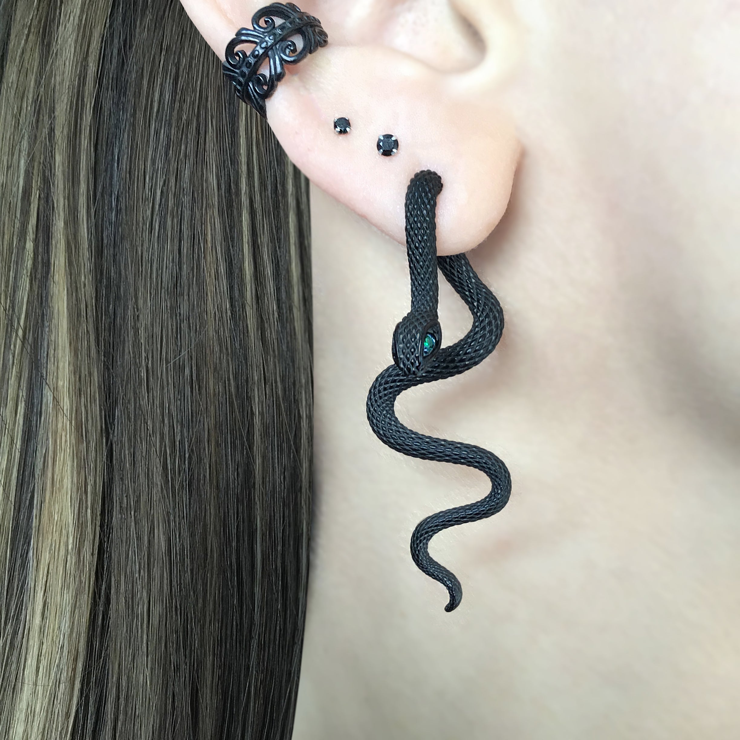 Snake ear jacket with Emerald CZ