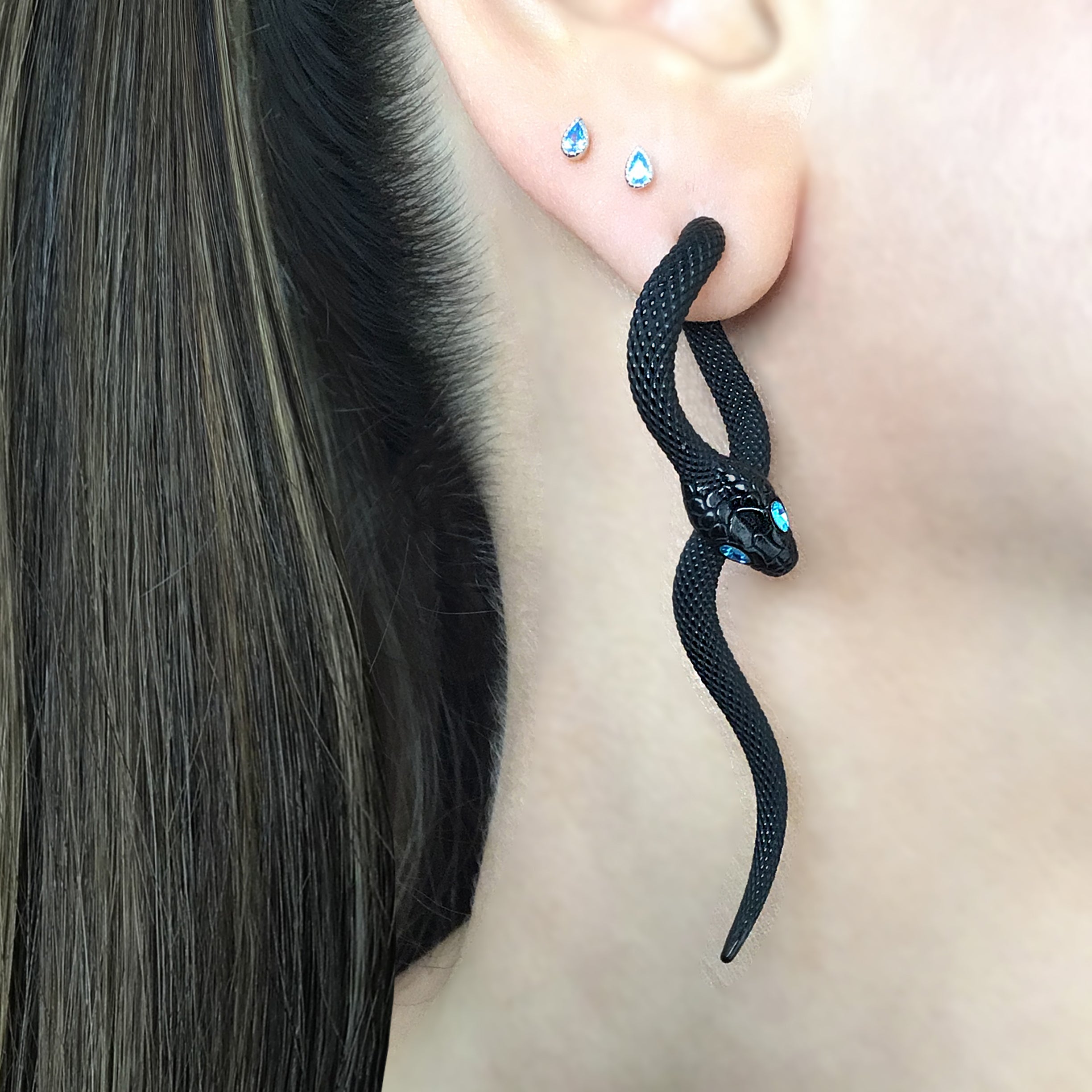 Snake front back earrings with aquamarine eyes