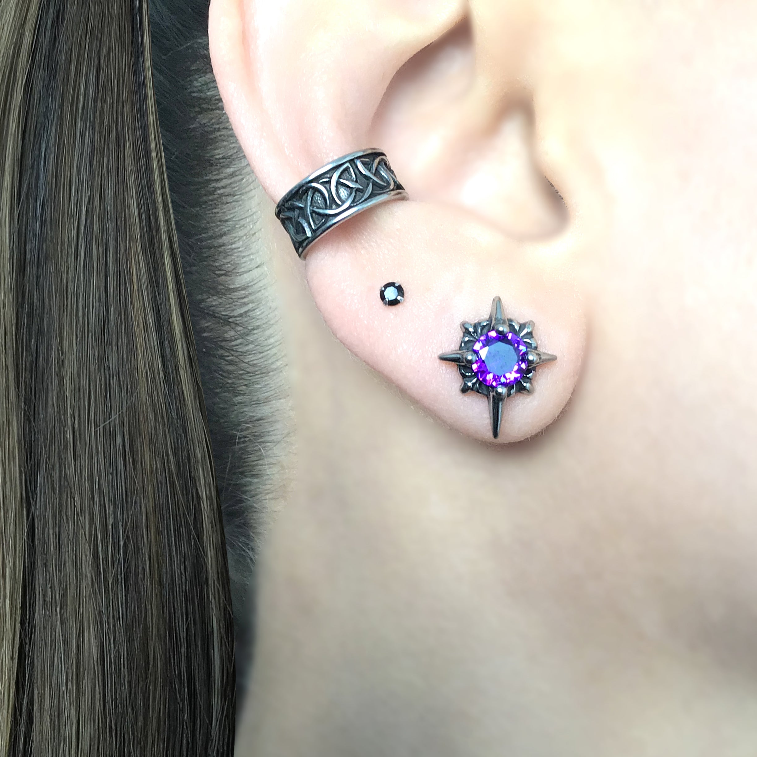 Starburst stud earrings with Purple CZ