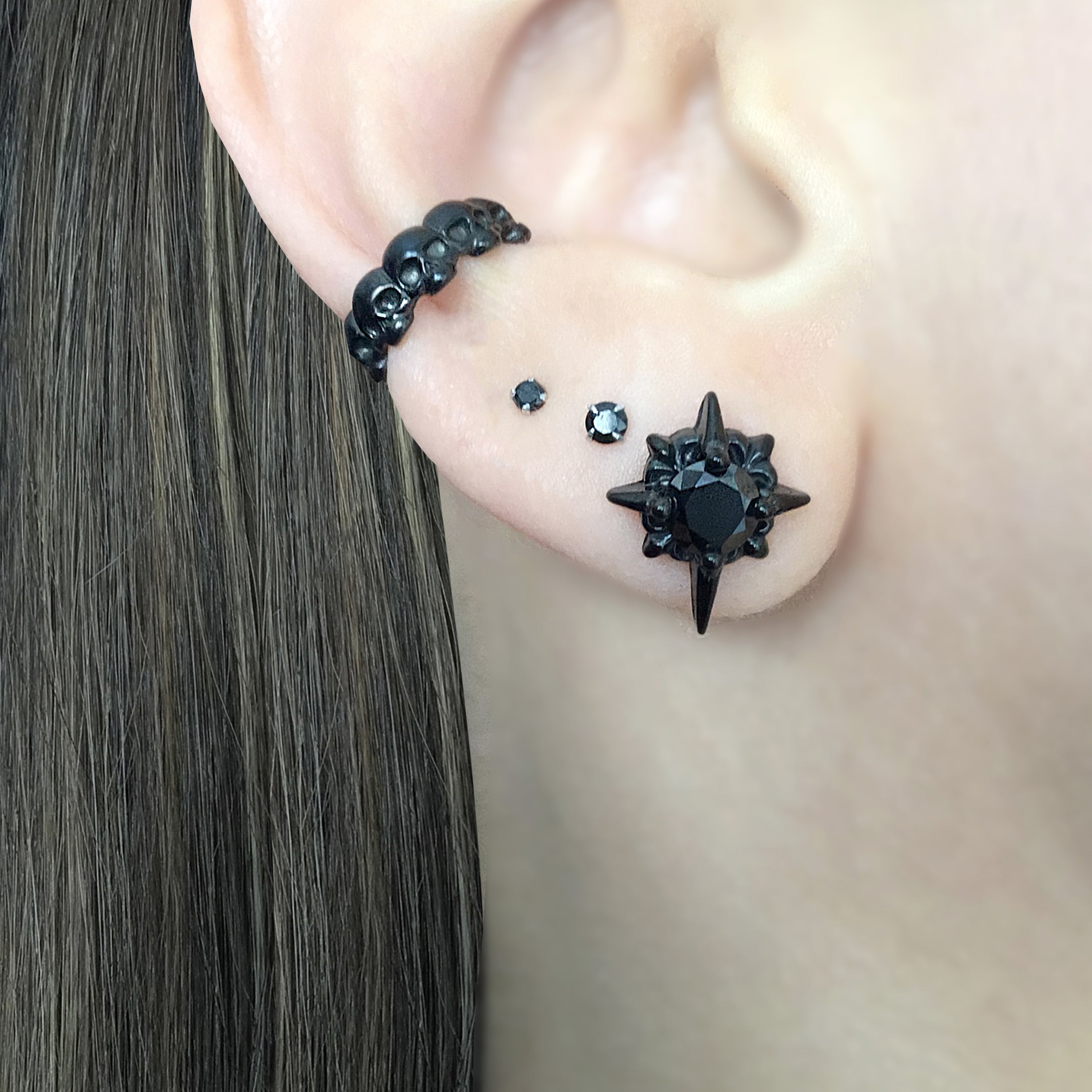 Black Starburst stud earrings with Black CZ