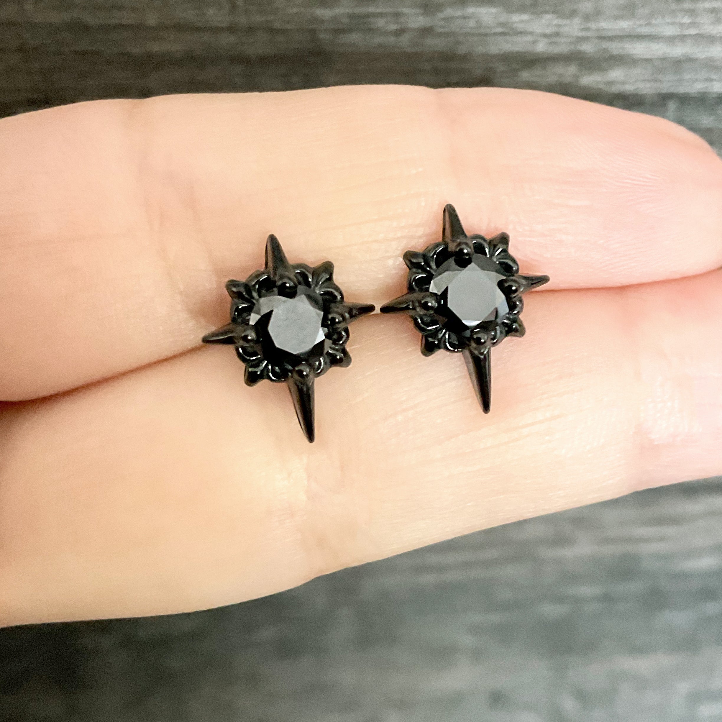 Black Starburst stud earrings with Black CZ