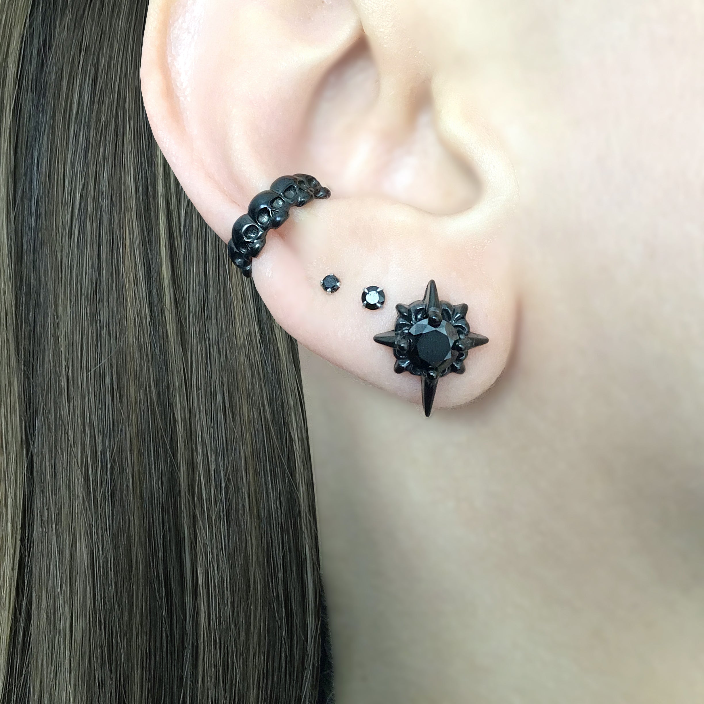 Black Starburst stud earrings with Black CZ