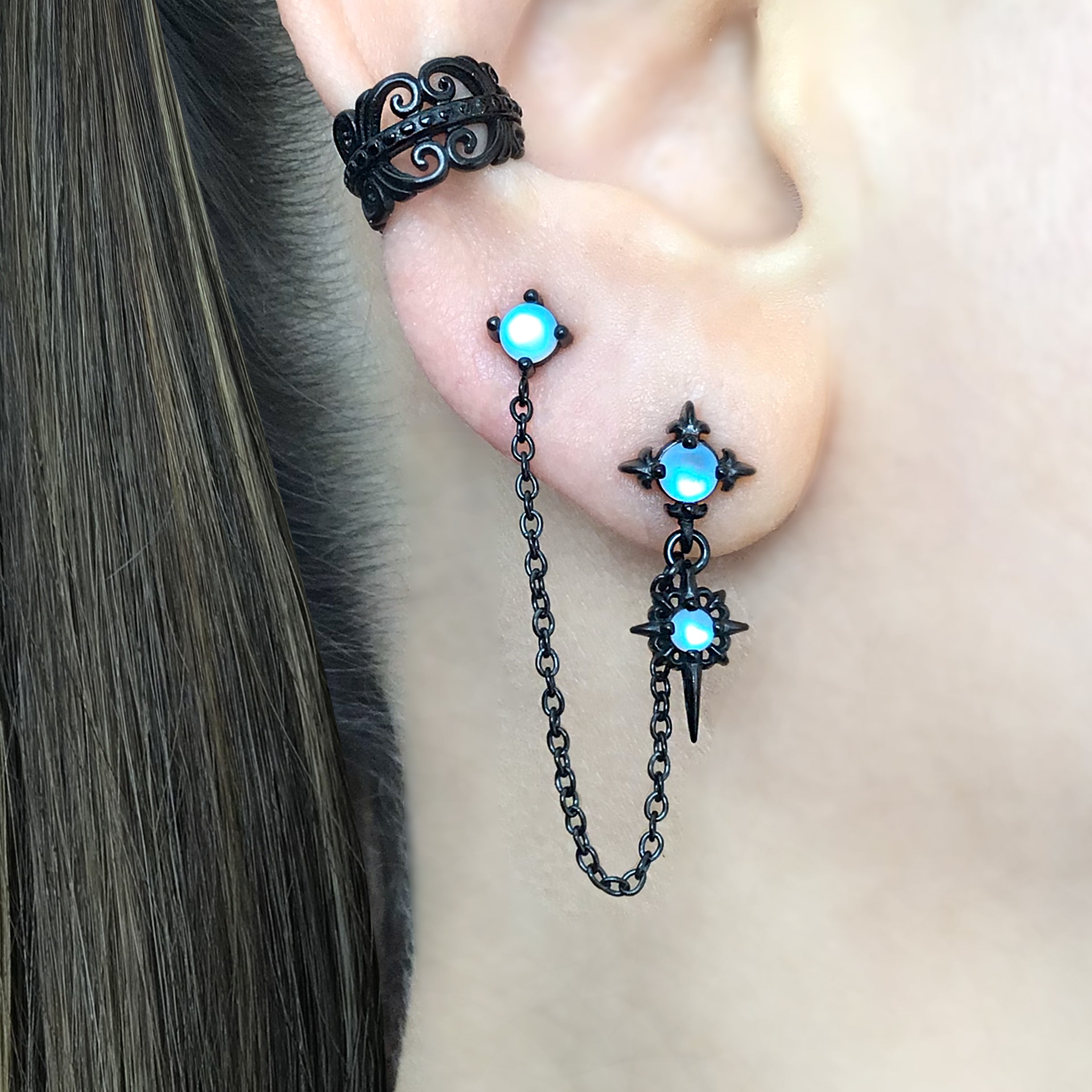 Double piercing Gothic Star earring with Blue glass