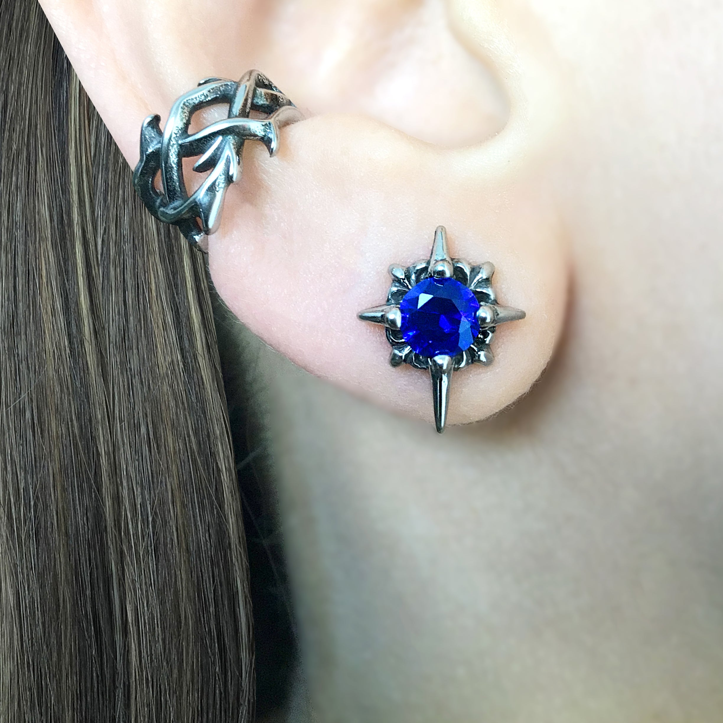 Starburst stud earrings with Sapphire blue CZ
