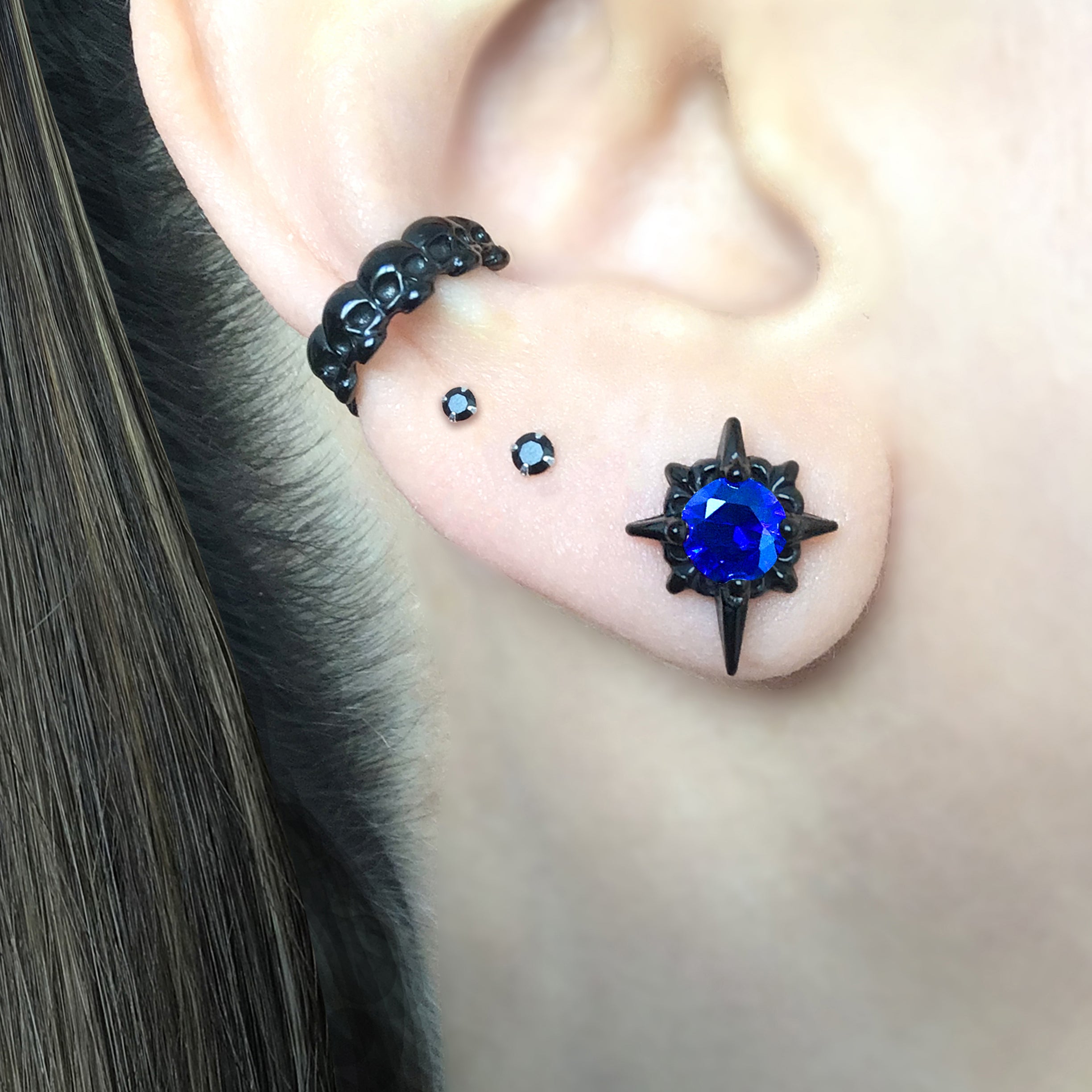 Starburst stud earrings with Sapphire blue CZ
