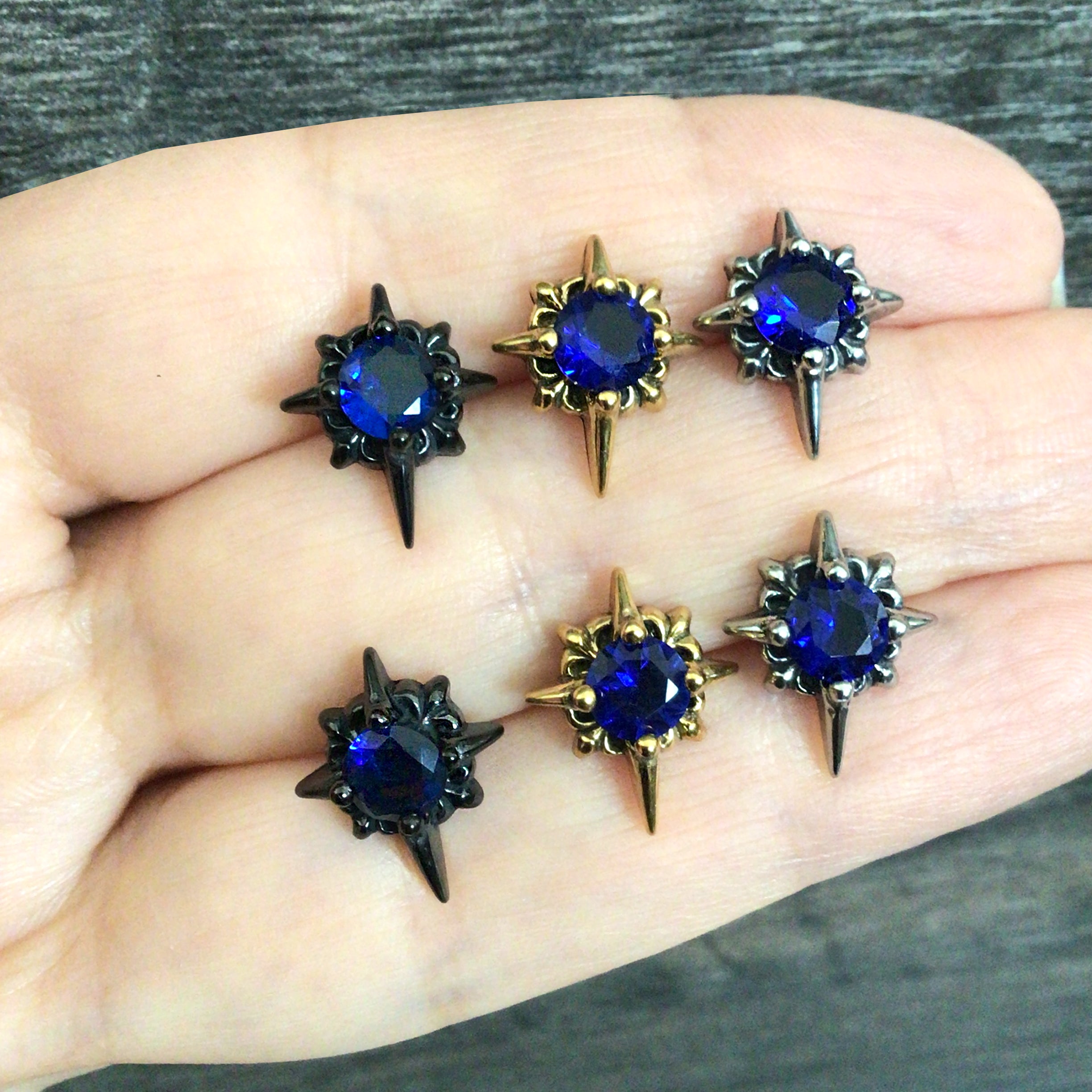 Starburst stud earrings with Sapphire blue CZ