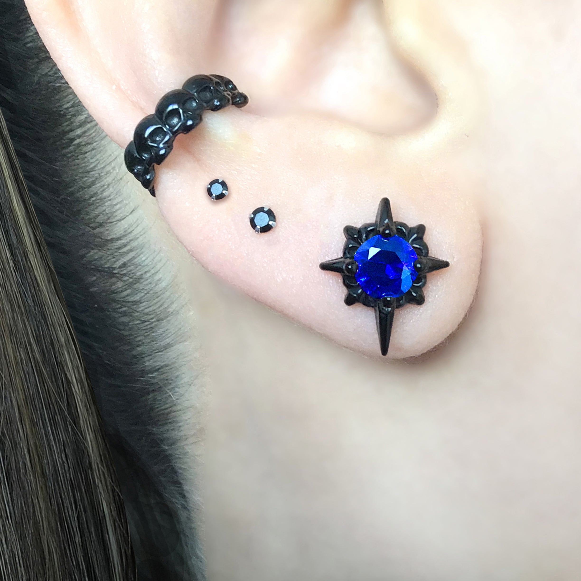 Starburst stud earrings with Sapphire blue CZ
