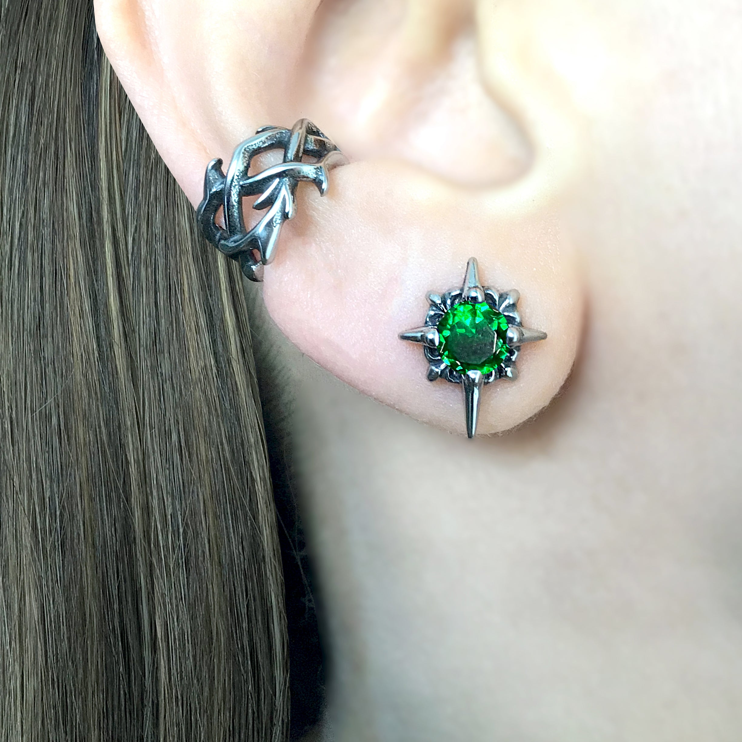 Starburst stud earrings with Green CZ
