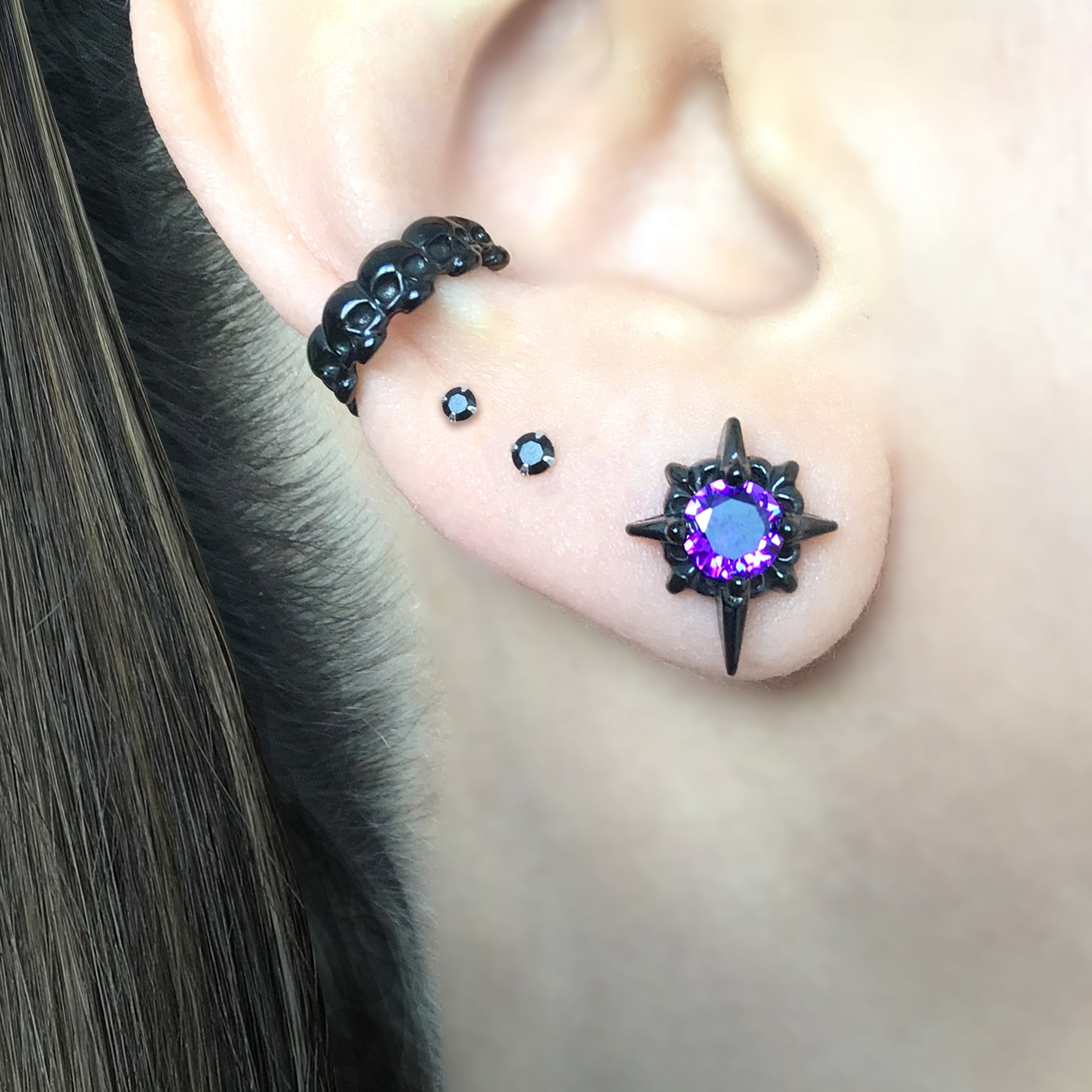Starburst stud earrings with Purple CZ