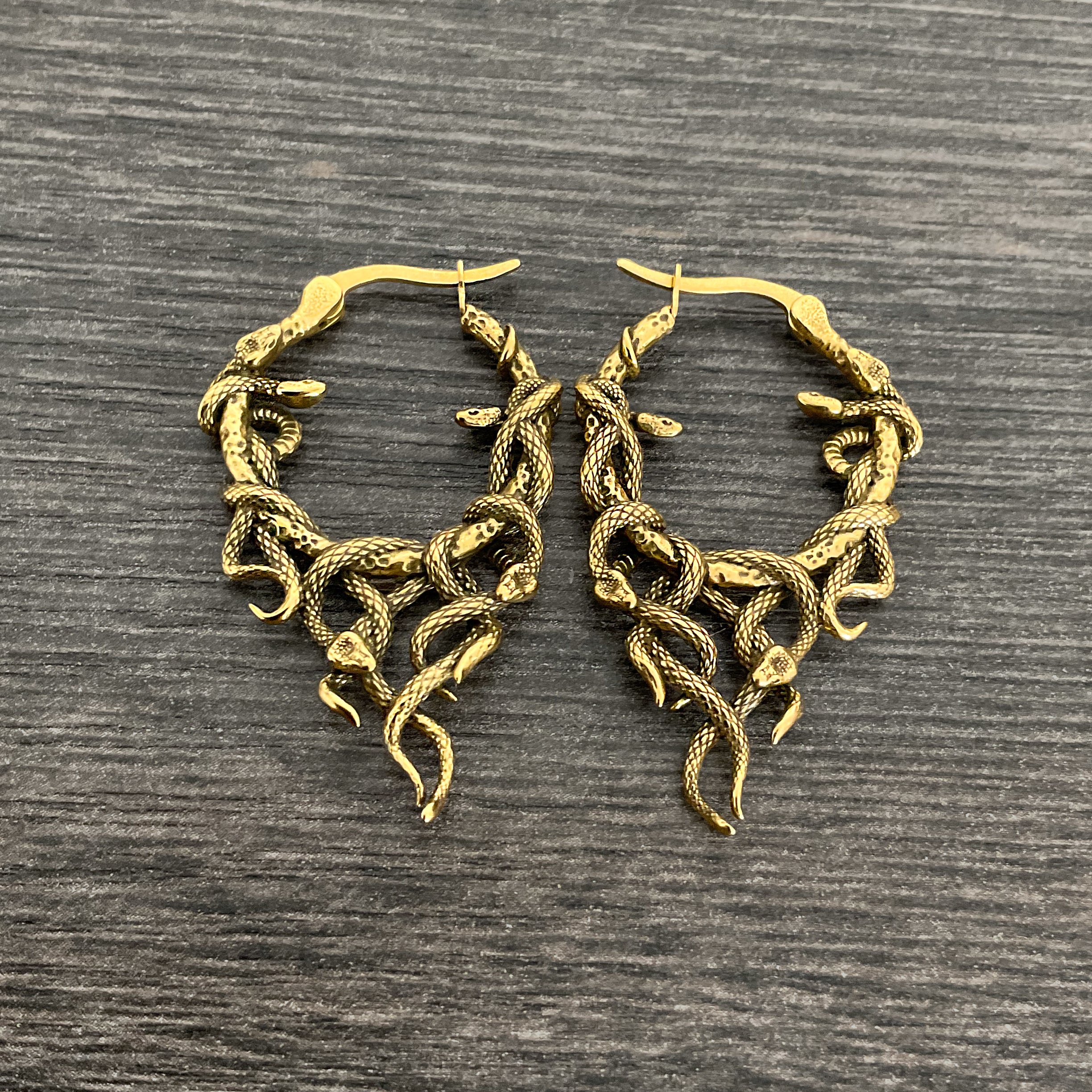 Aura Snake hoop earrings  in Gold