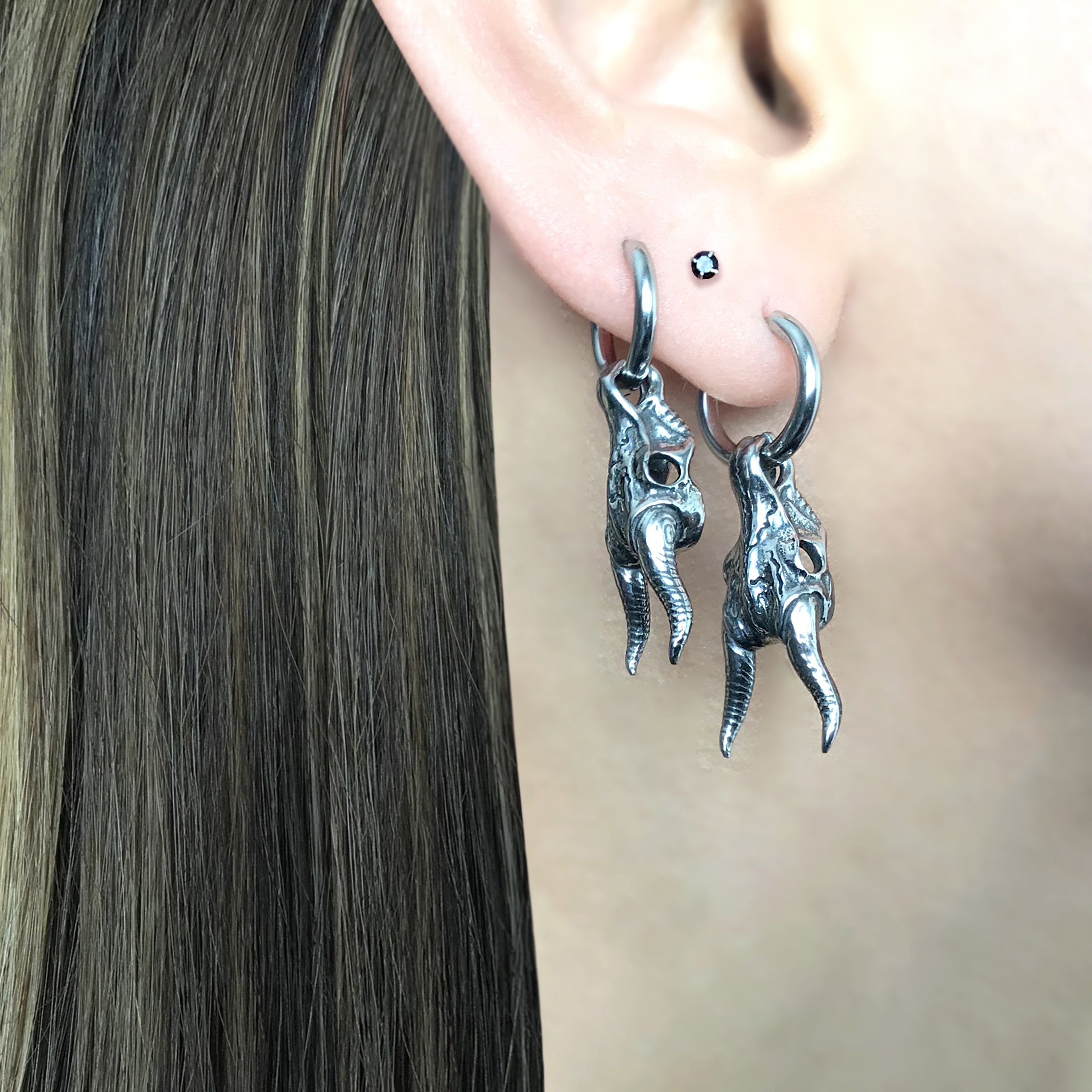 Blesbok skull hoop earrings in Silver