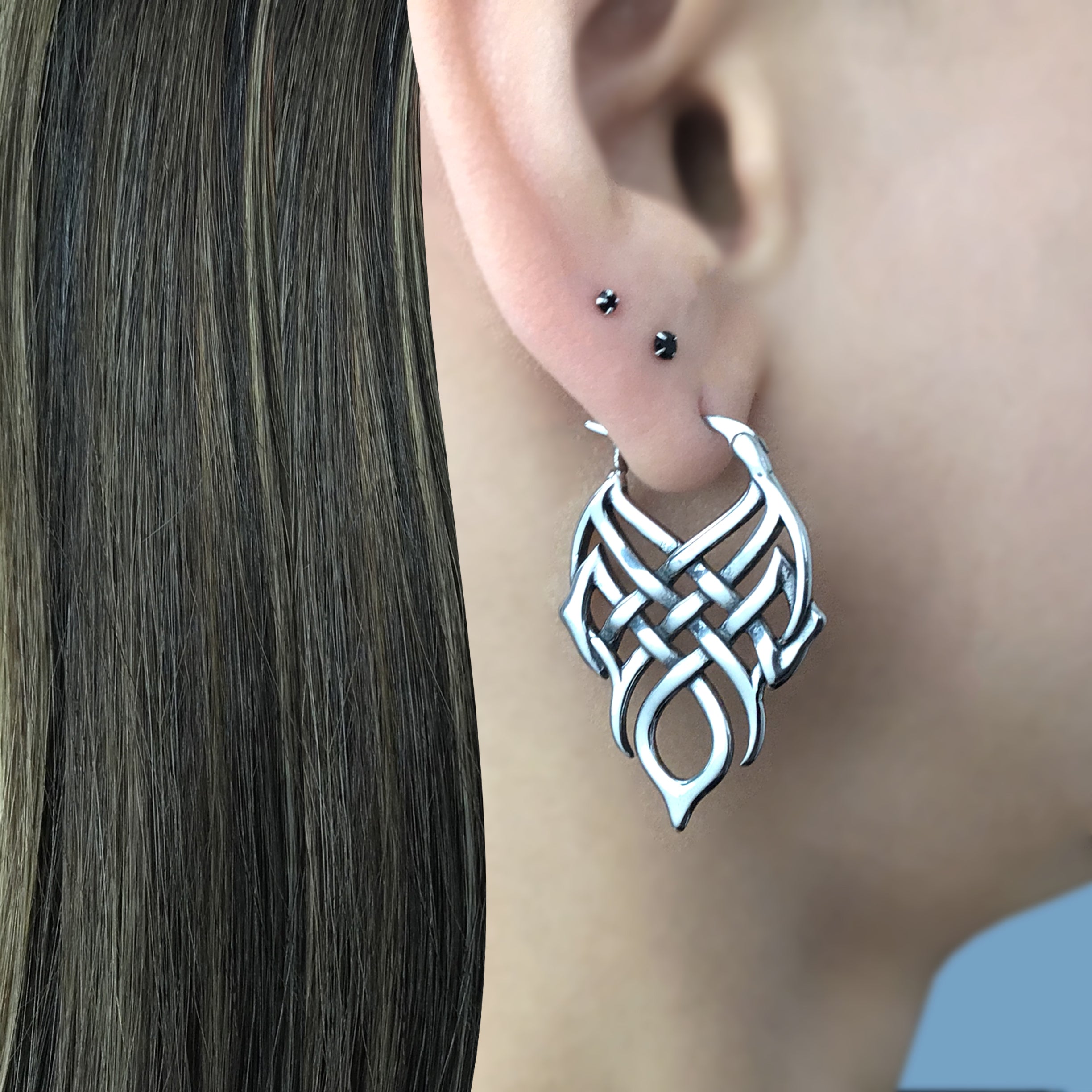 Celtic knot hoop earrings in Silver