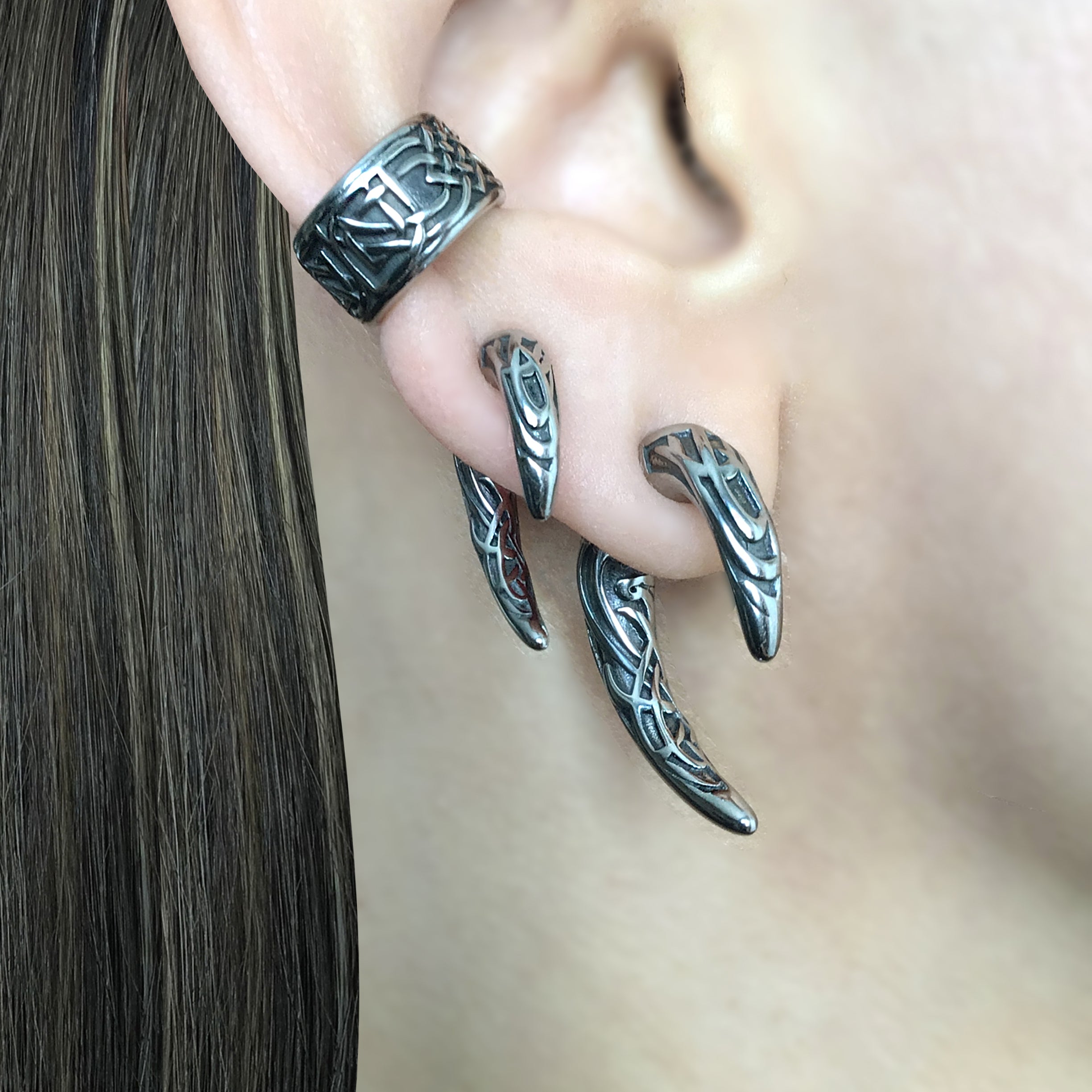 Claw ear jacket with Celtic design