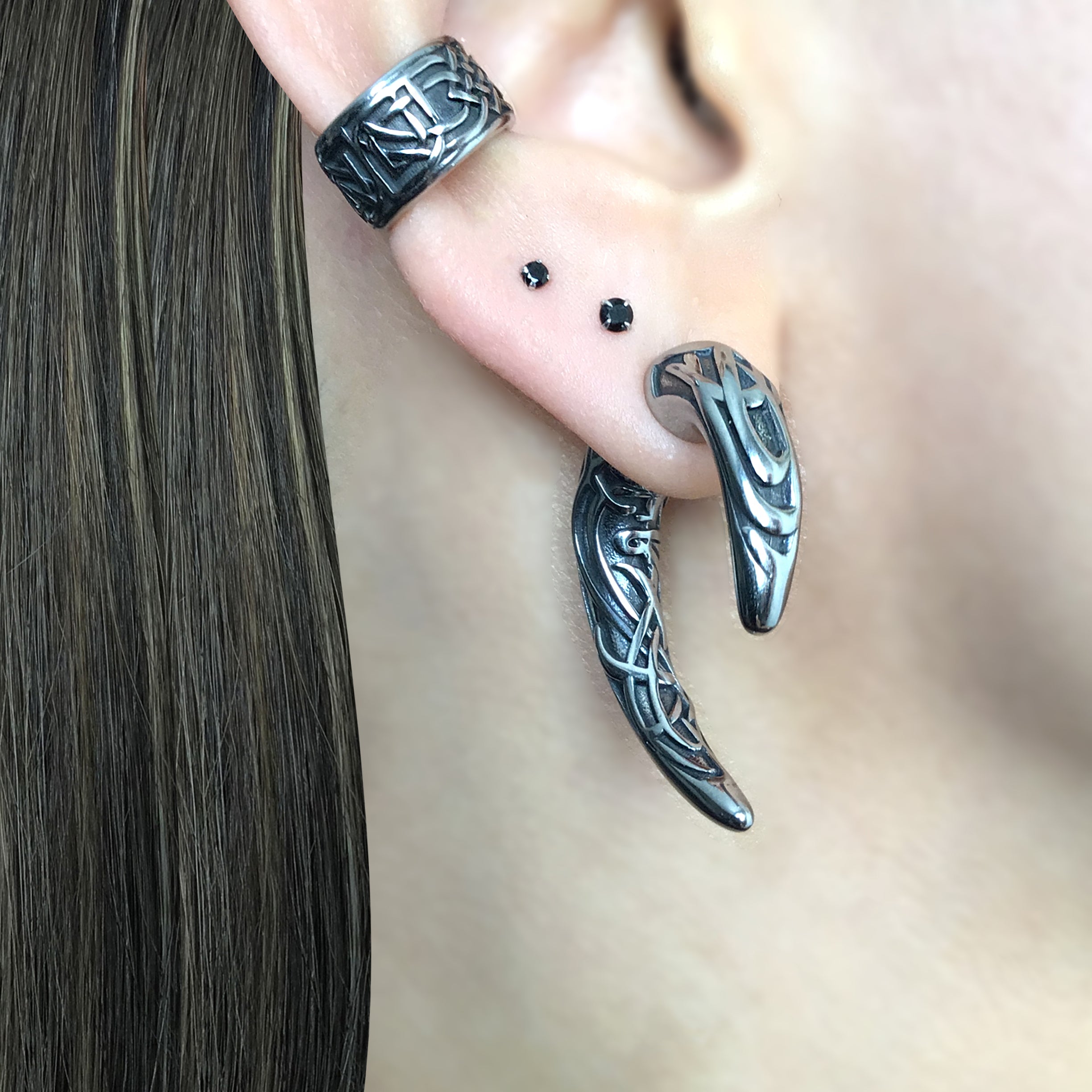 Claw ear jacket with Celtic design