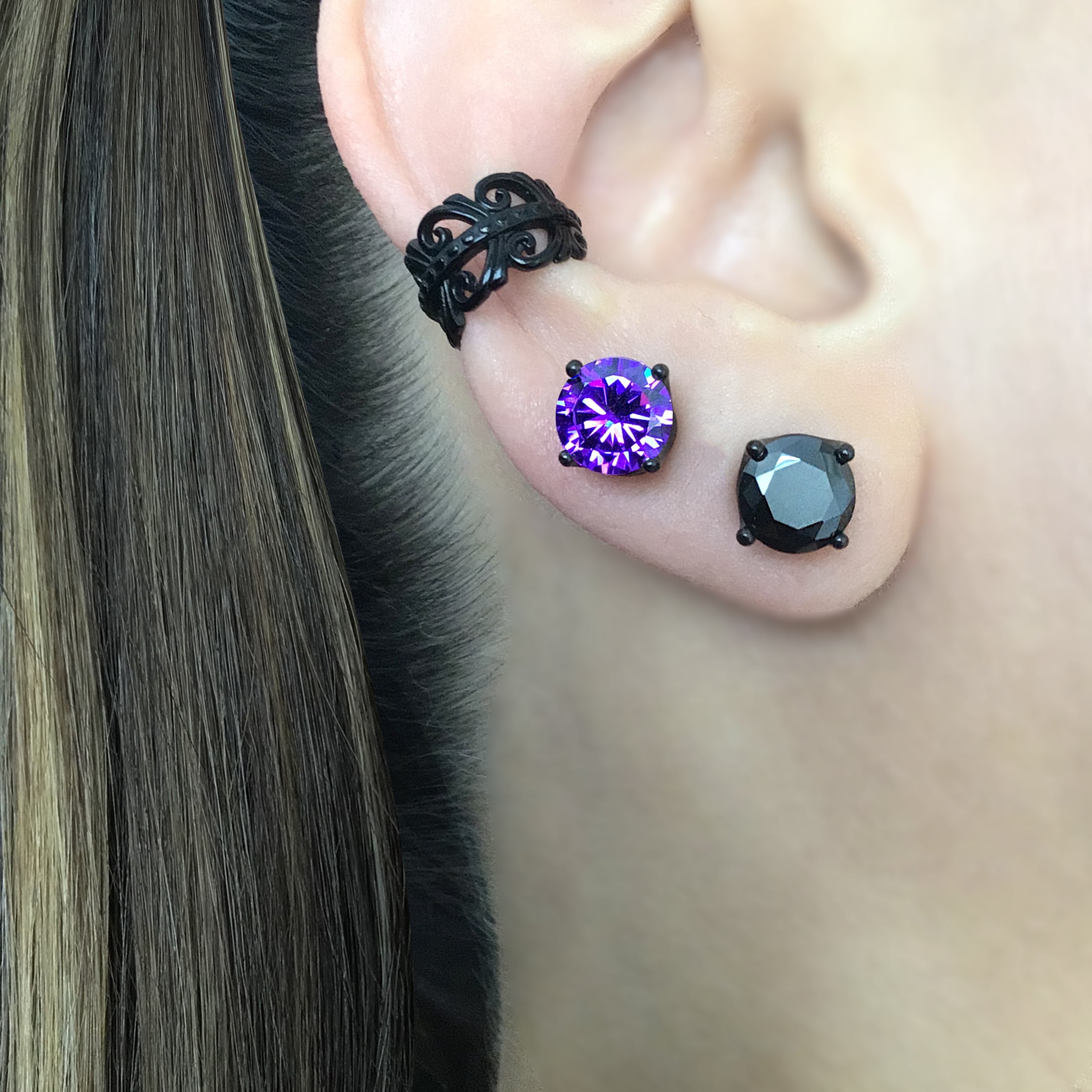 Stud earrings in crown setting