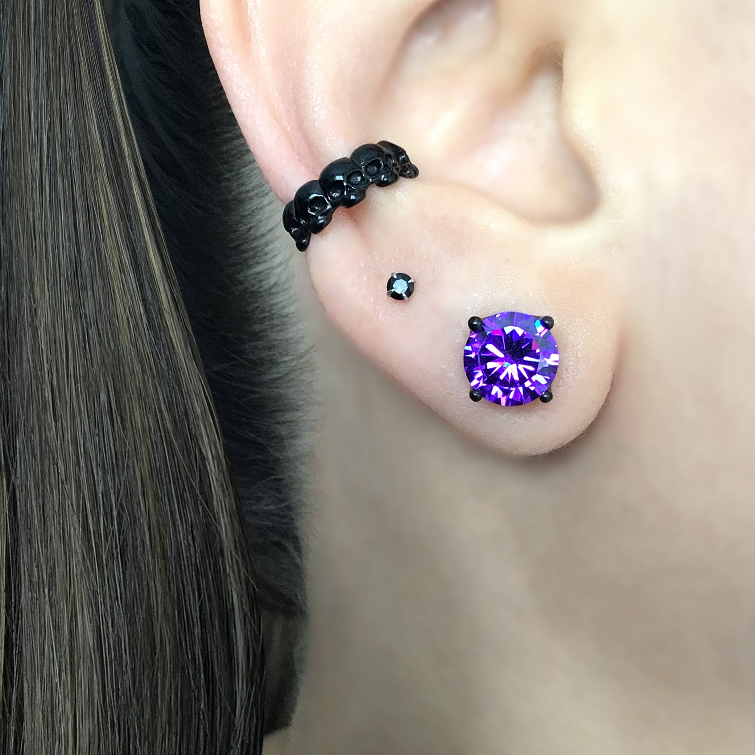 Stud earrings in crown setting