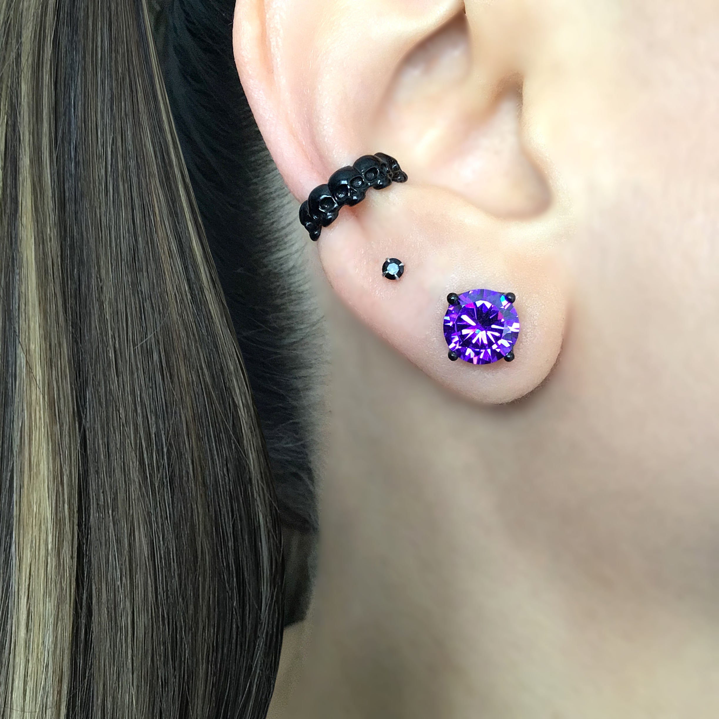 Stud earrings in crown setting