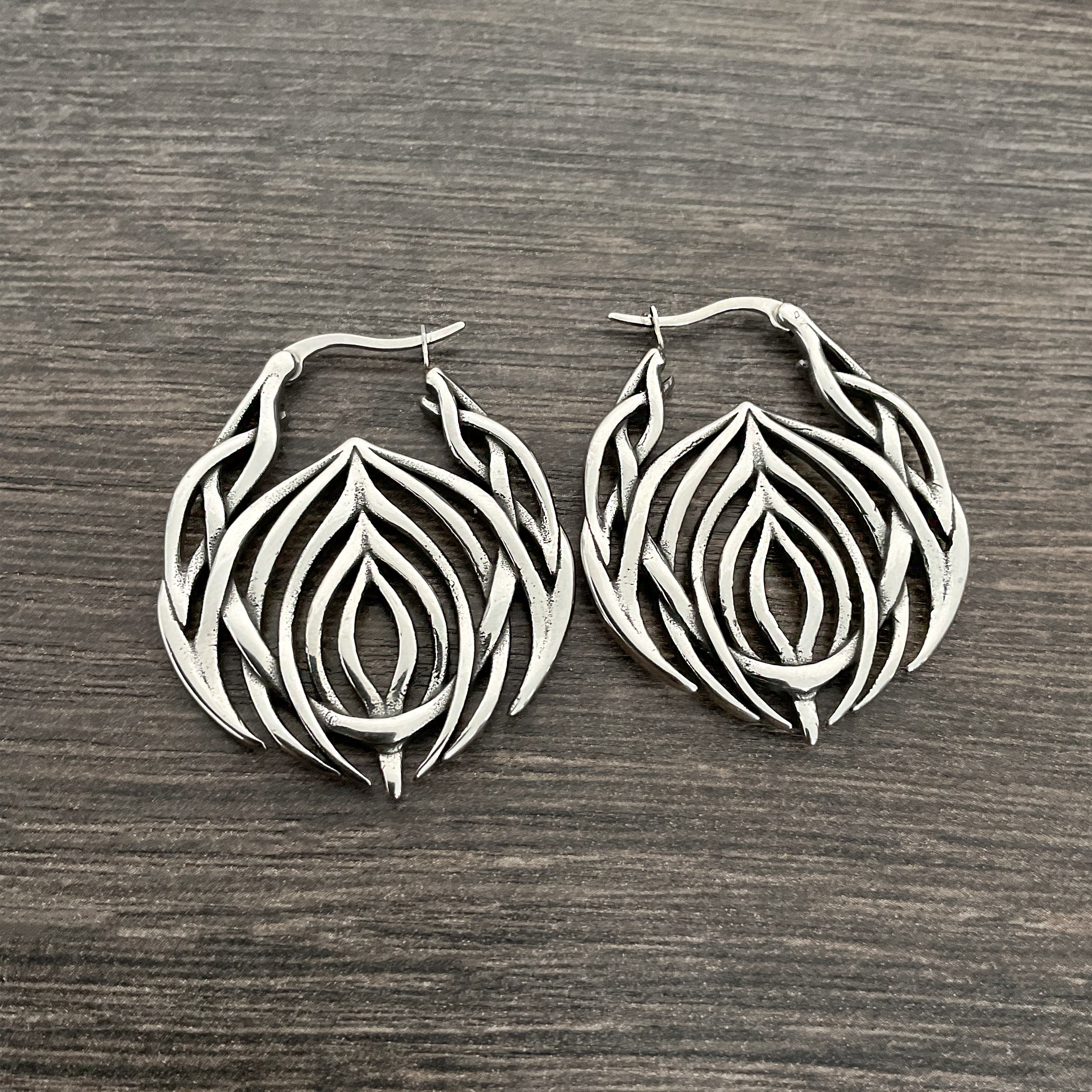 Tribal cyber hoop earrings in Black