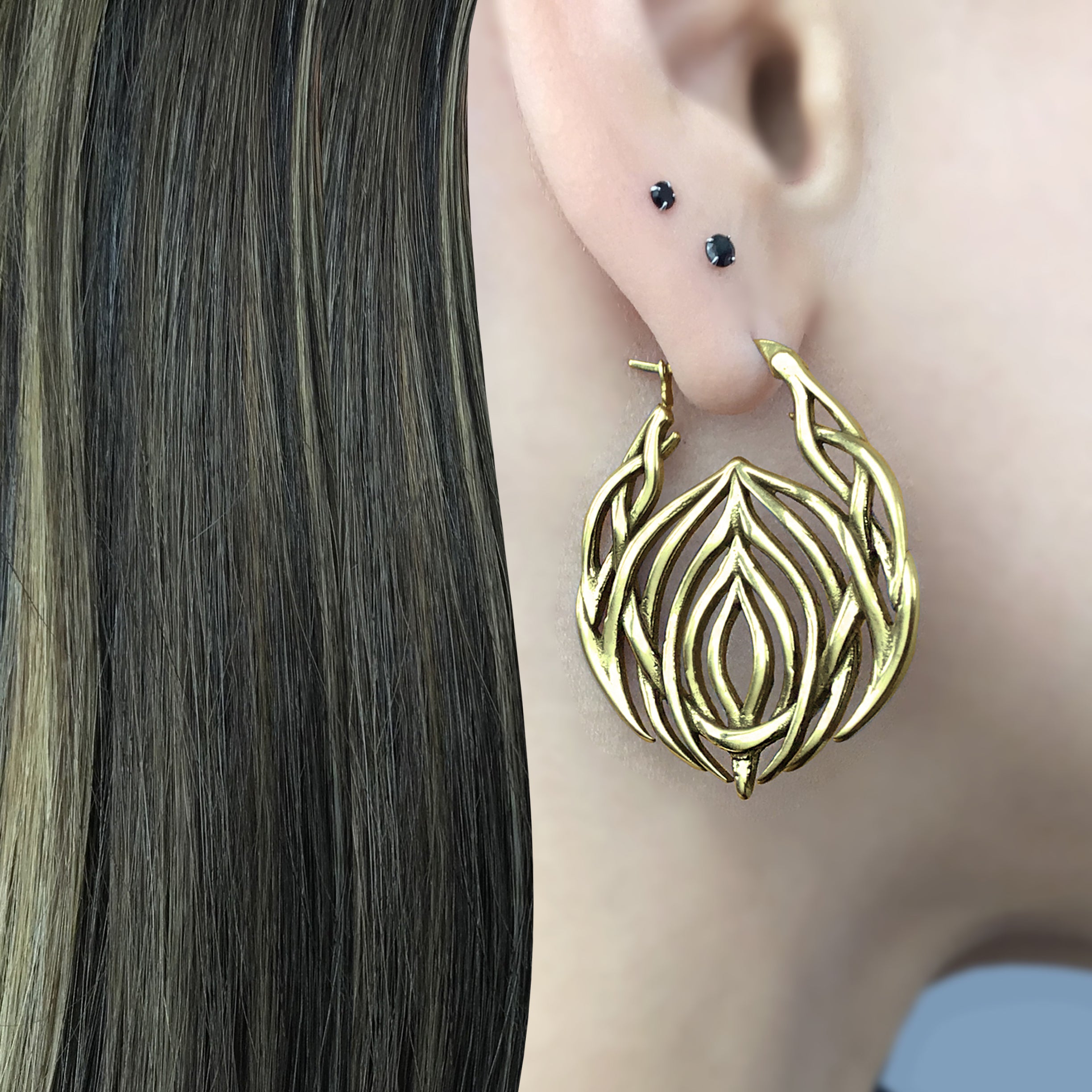 Tribal cyber hoop earrings in Black