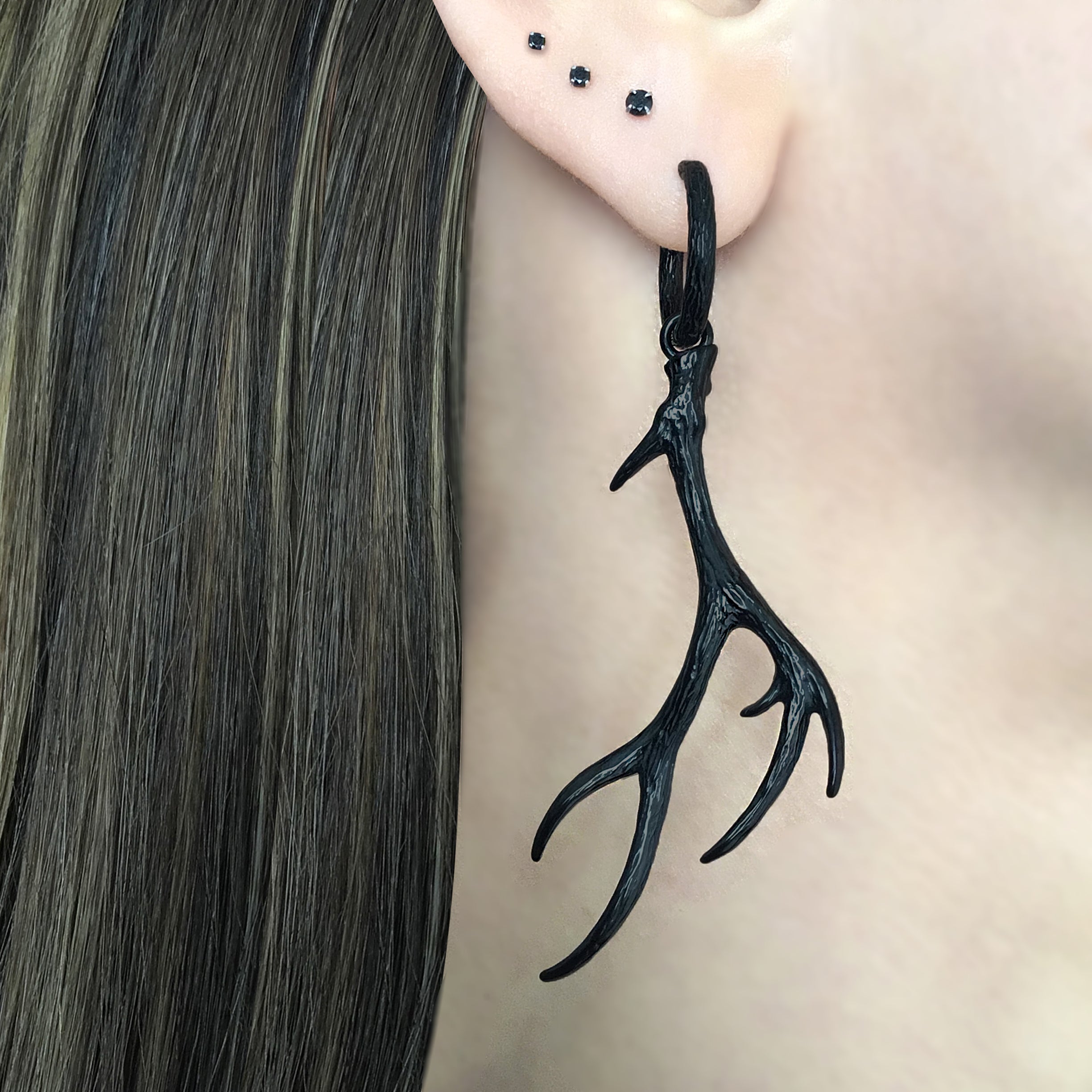 Deer antlers hoop earrings in Black