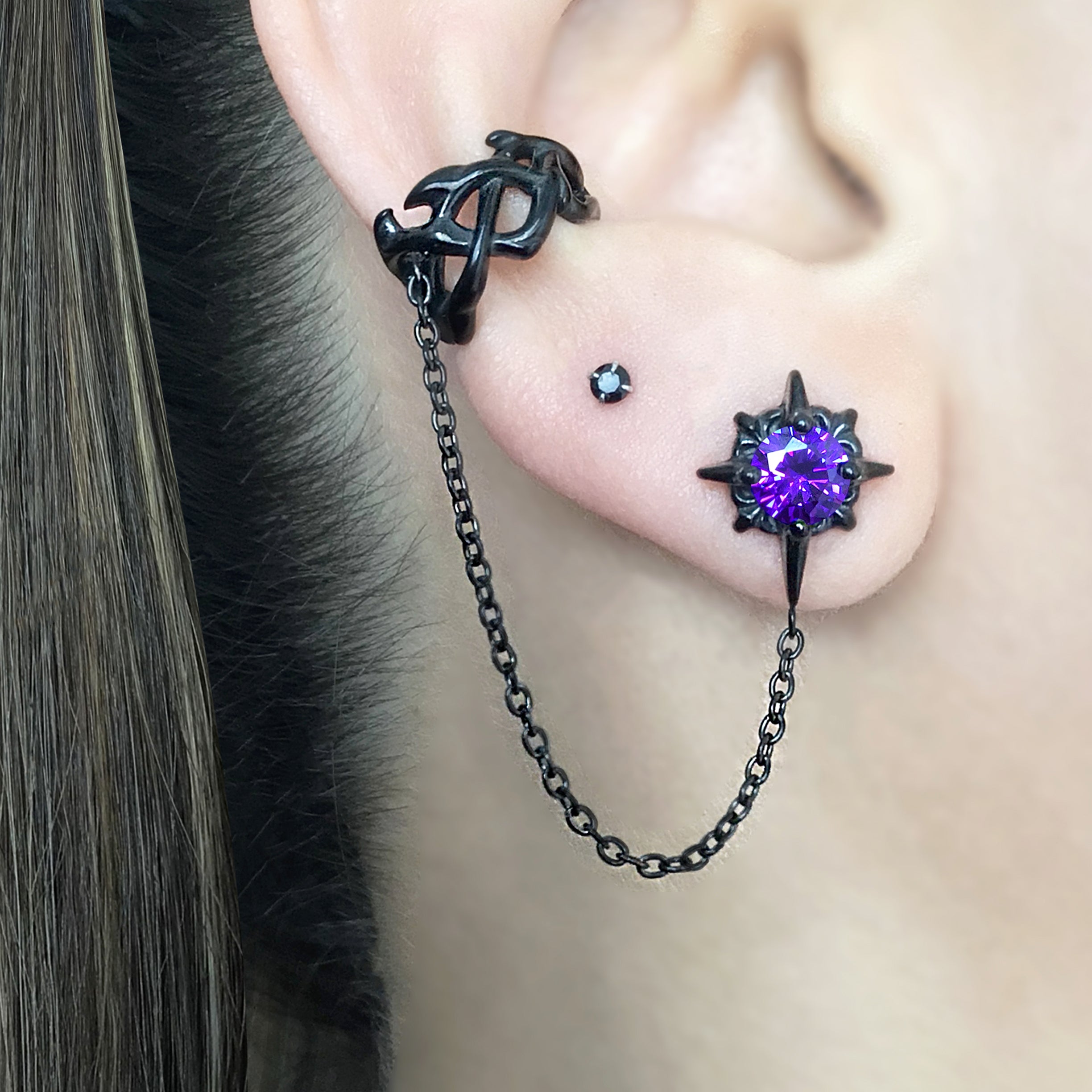 Starburst earring with ear cuff attached in Black