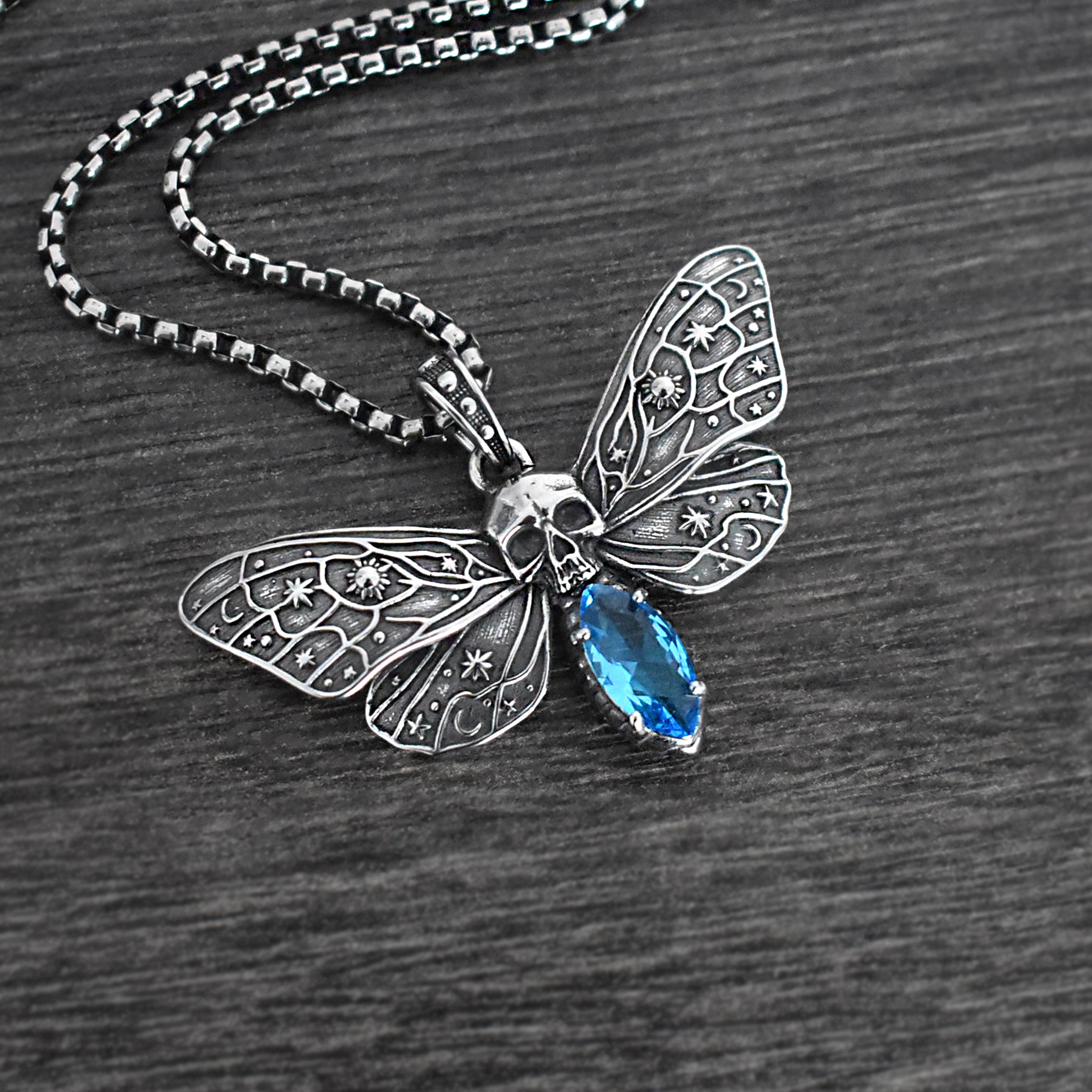Cosmic Skull Moth Necklace with Blue stone