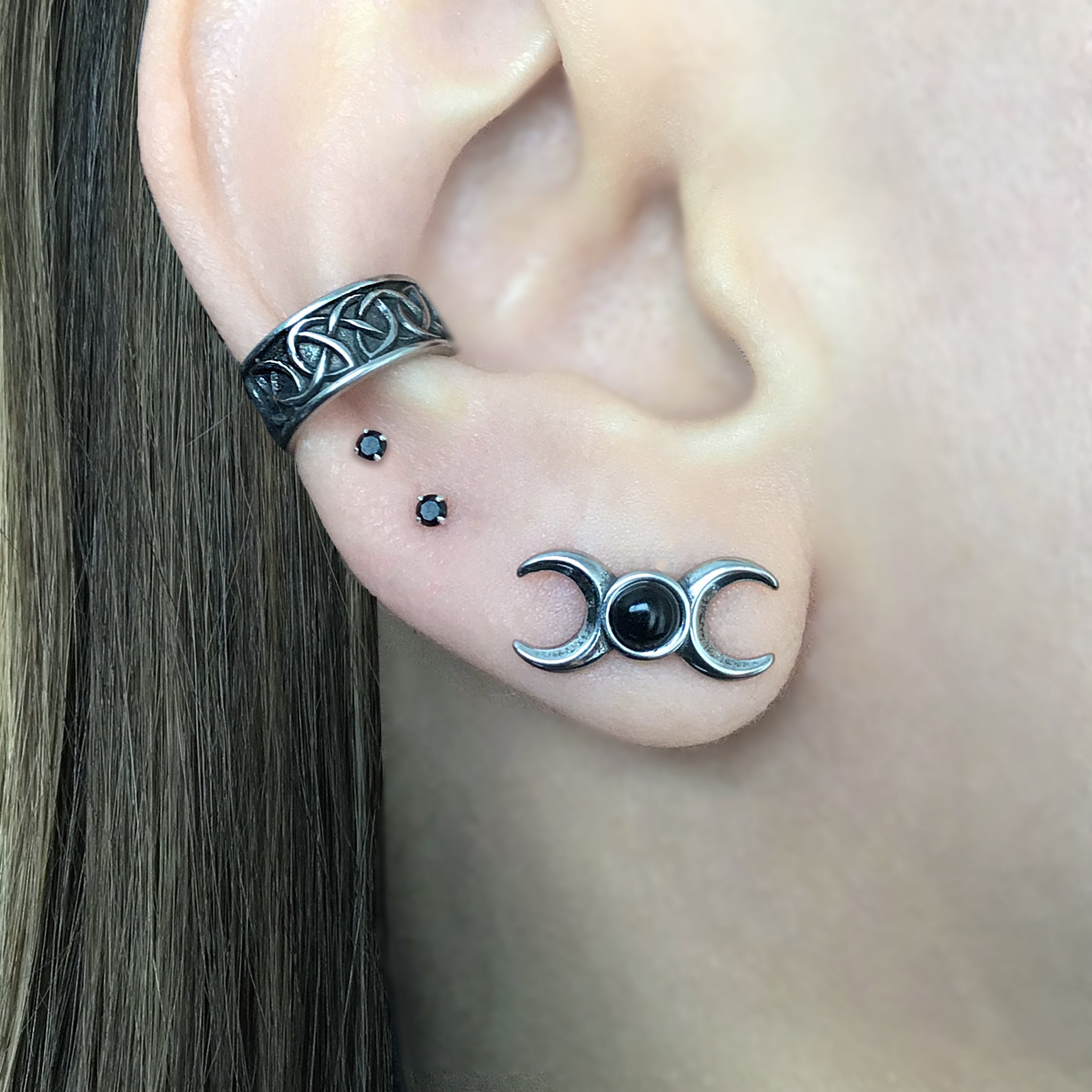 Two moons stud earrings with Black stone