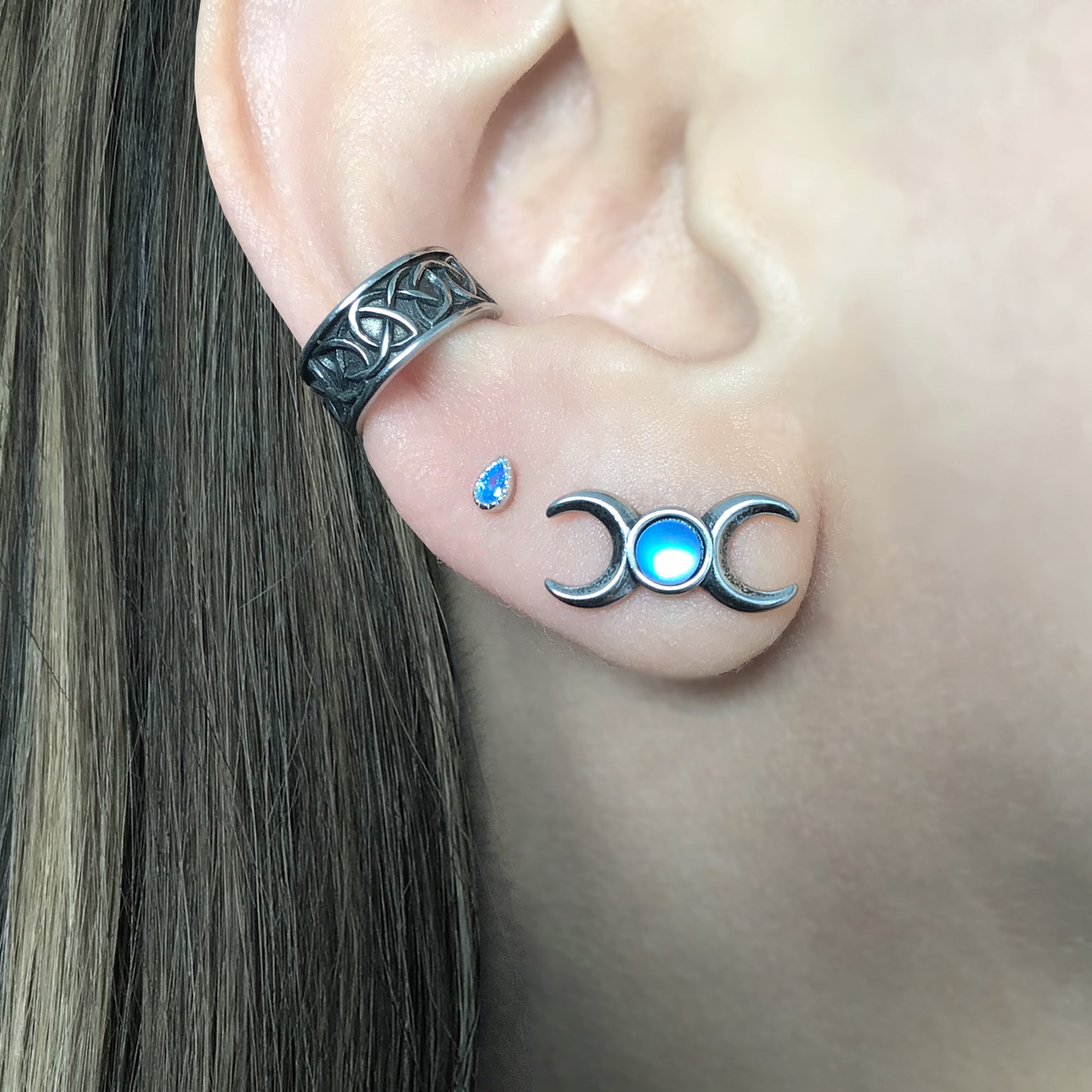 Two moons stud earrings with Blue stone