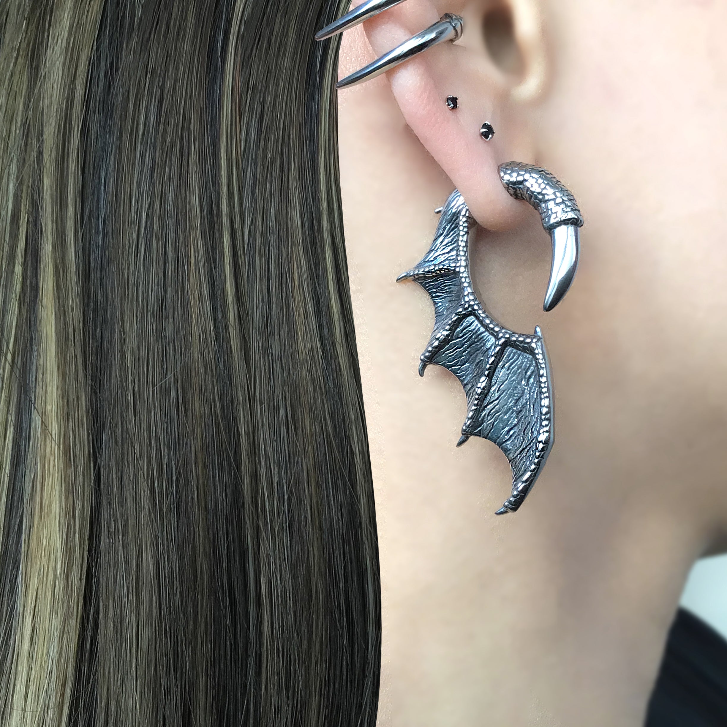 Dragon wing and claw earrings