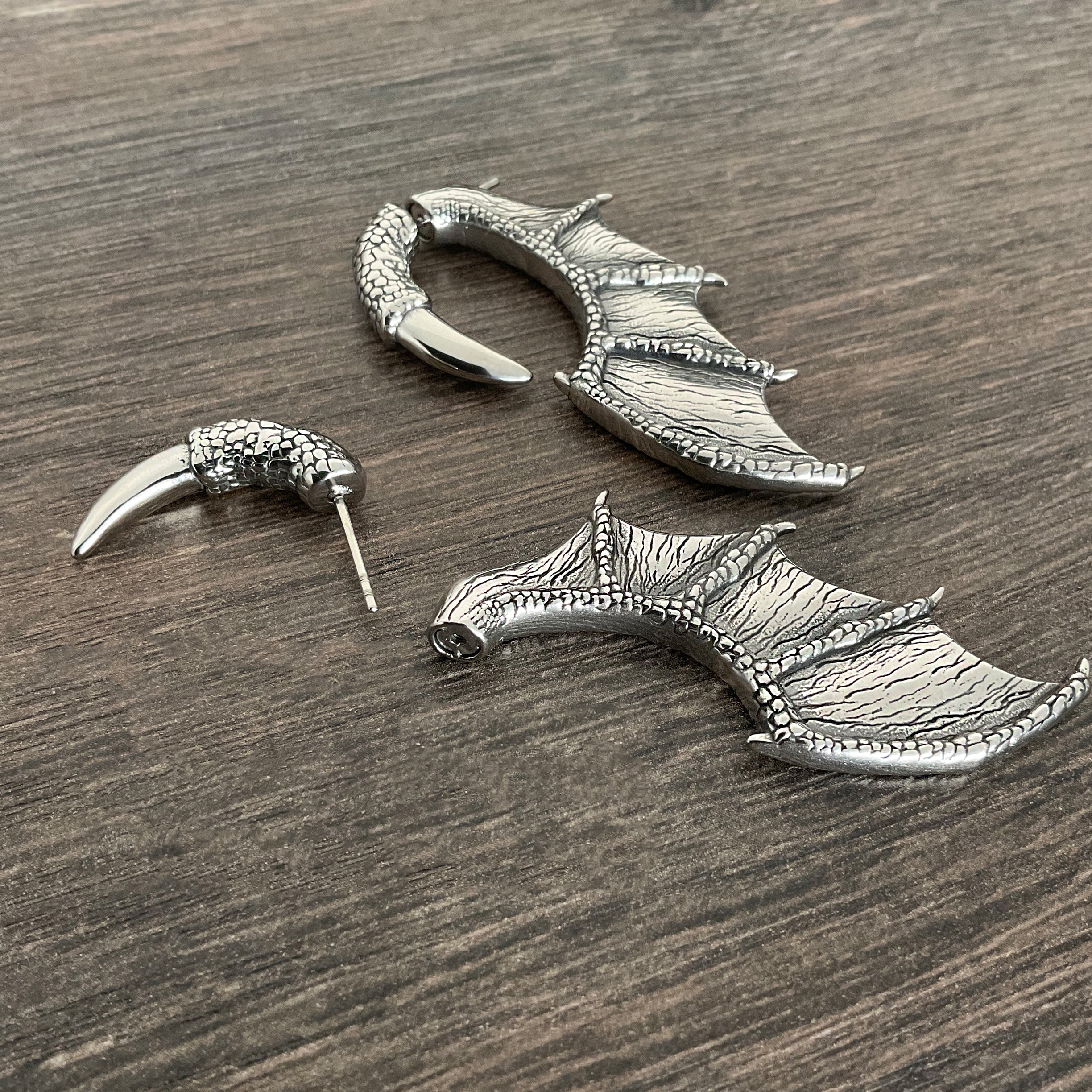 Dragon wing and claw earrings