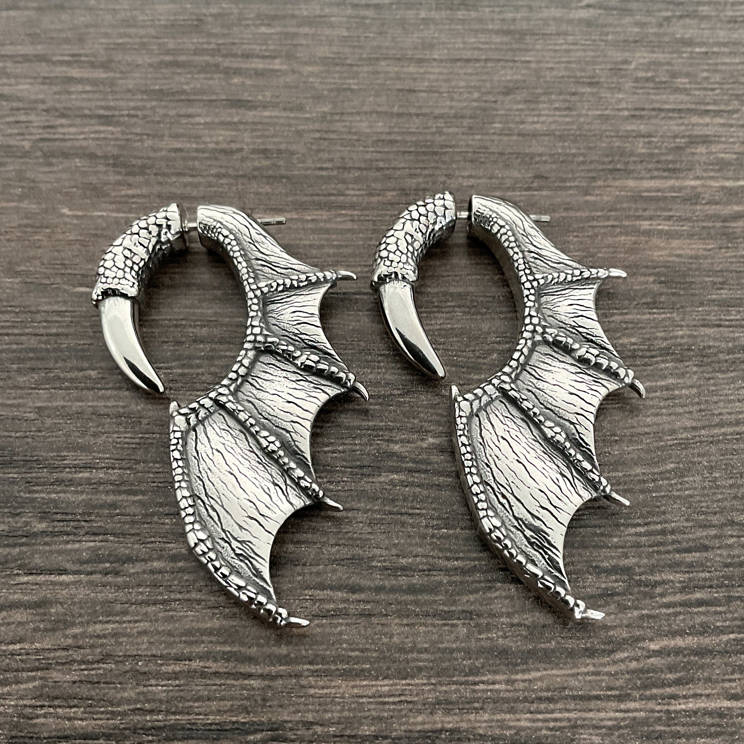 Dragon wing and claw earrings