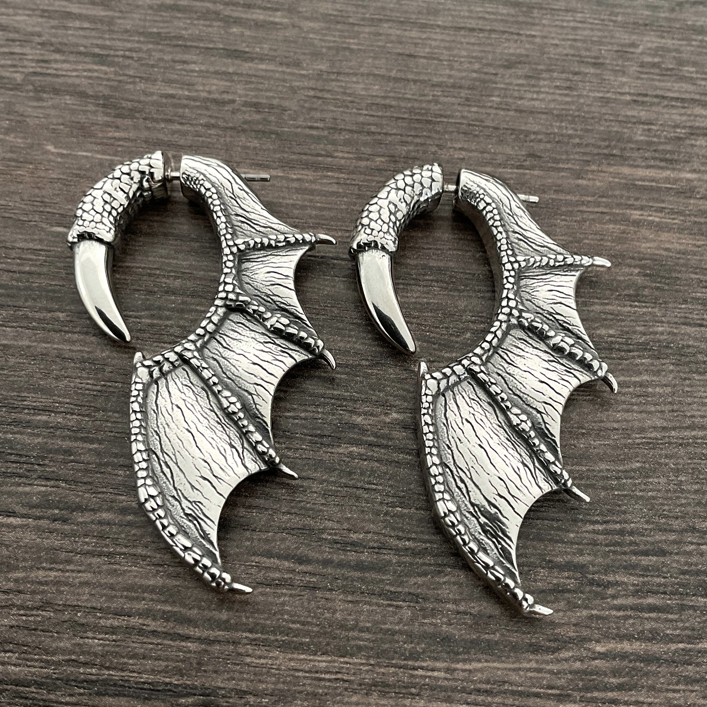 Dragon wing and claw earrings